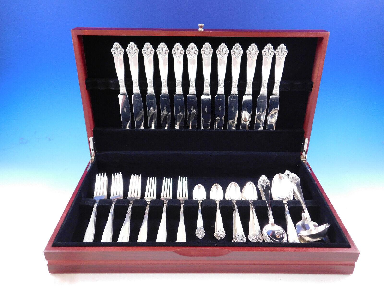 Scandinavian Lillemor by Marthinsen 830S silver Norway dinner size flatware set with unique pierced handles - 74 pieces. This set includes:


12 Dinner Size Knives, 9 5/8