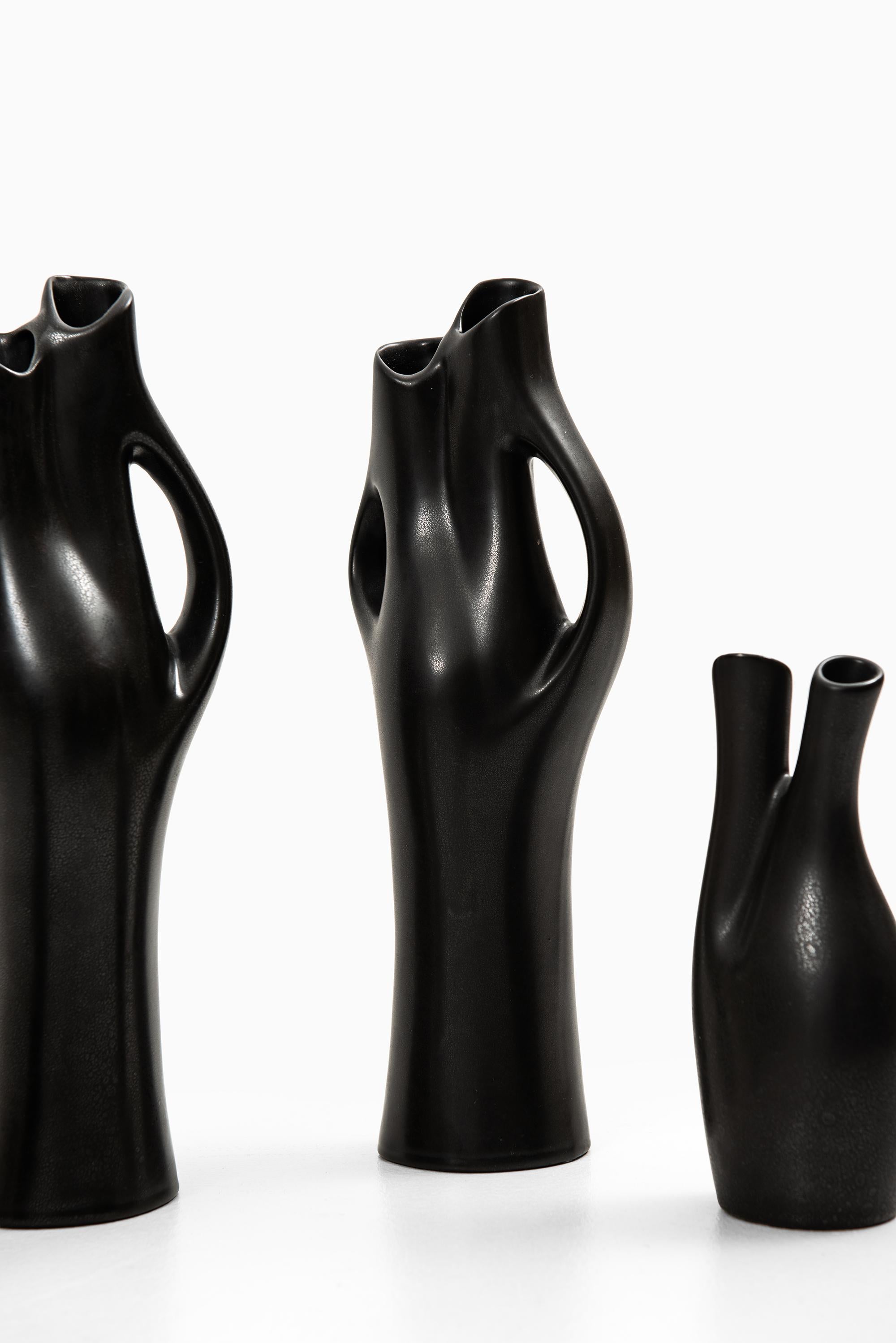 Set of 4 stoneware vases Mangania designed by Lillemor Mannerheim. Produced by Upsala Ekeby in Sweden.