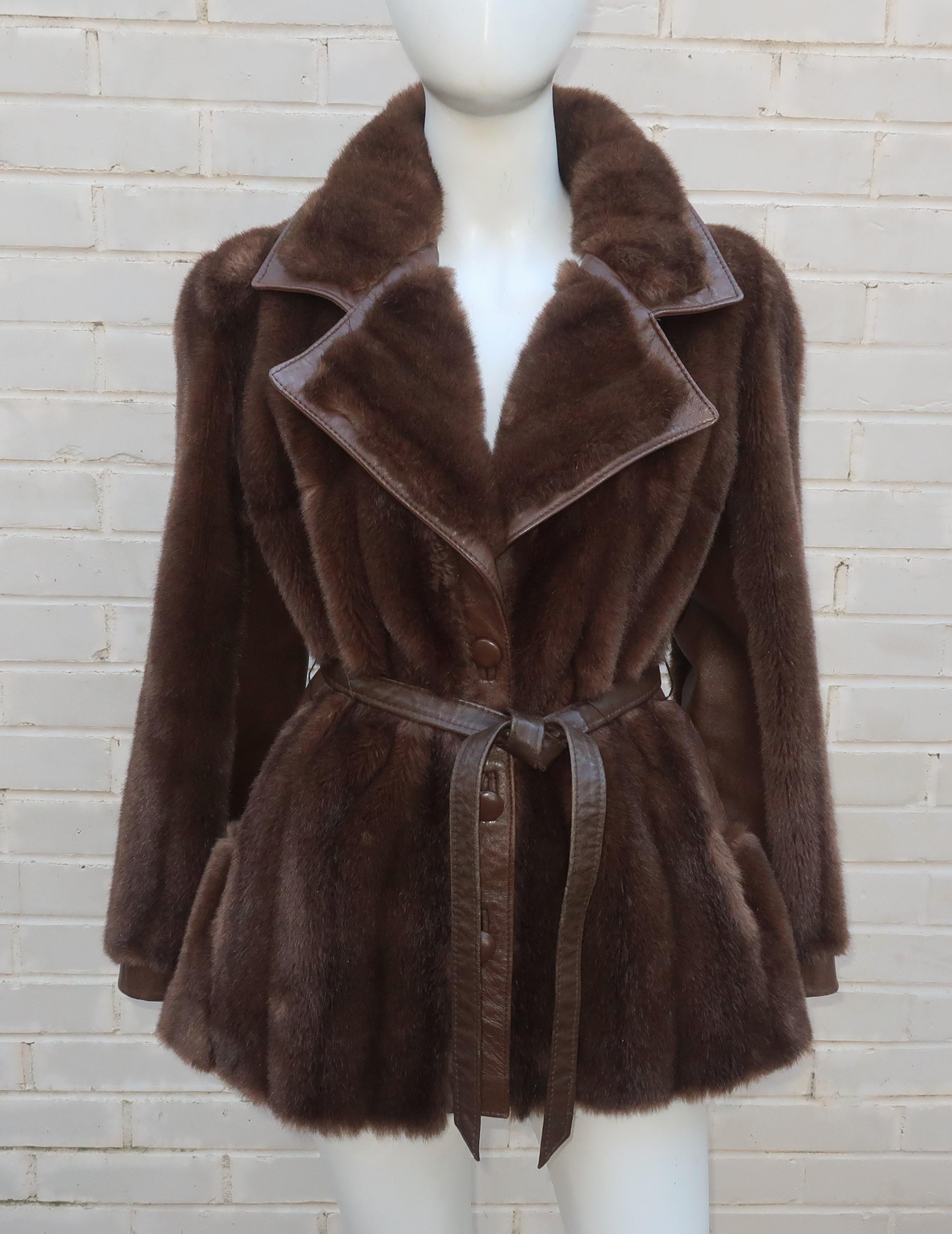 Faux and Fabulous!  1960's Lilli Ann brown faux fur jacket with leather details and trim.  This mod design was made in England and has a cozy style that is perfect for topping off casual ensembles.  The faux fur is an acrylic cotton blend and looks