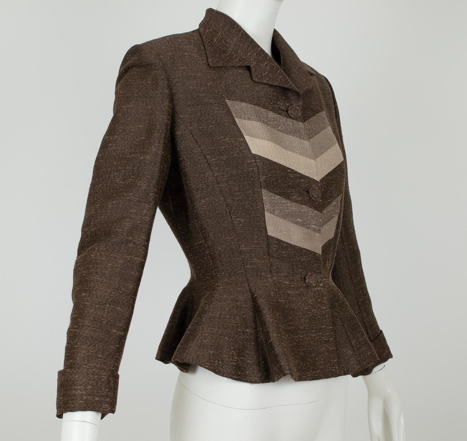 With the sharp shoulders of the 1940s and the impossible wasp-waisted peplum of the 1950s, this gorgeous jacket represents a time when women’s roles were changing from wartime laborers to suburban housewives. All the hallmarks of an exquisitely made