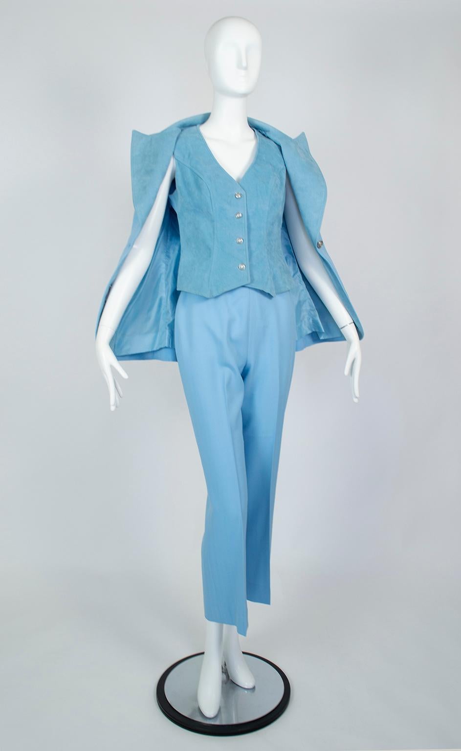Don’t let the color fool you into thinking it’s a Disco-era castoff.  A dash of Elvis (the lapels), a pinch of YSL (