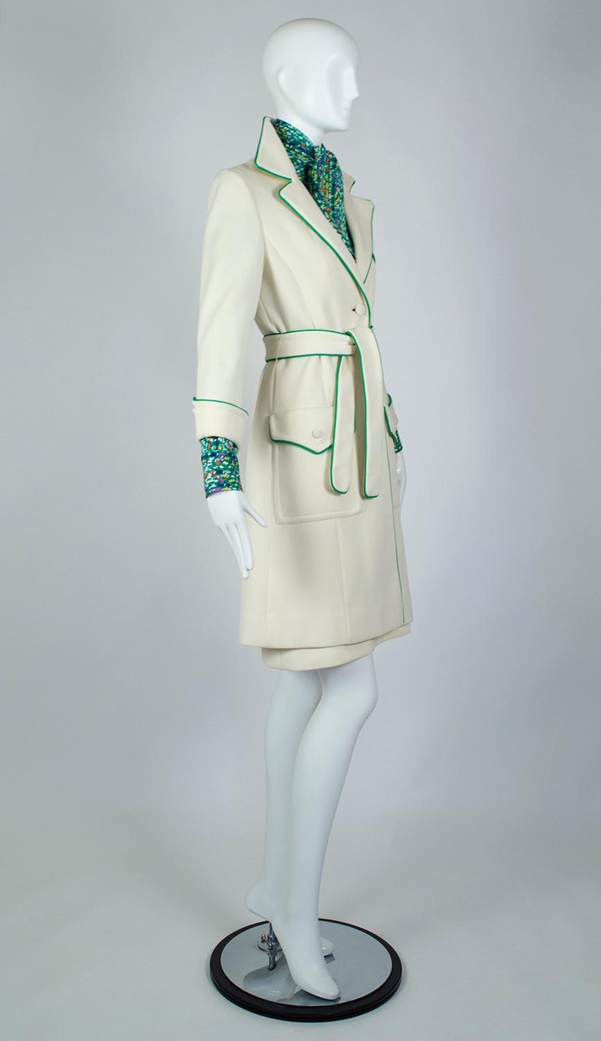 Reminiscent of the Mod Squad air hostess uniforms of Braniff and TWA, this impeccable matching coat and dress ensemble are a walking ray of sunshine. A 3-piece outfit including a shirt dress with attached neck scarf, matching belt and piped trench