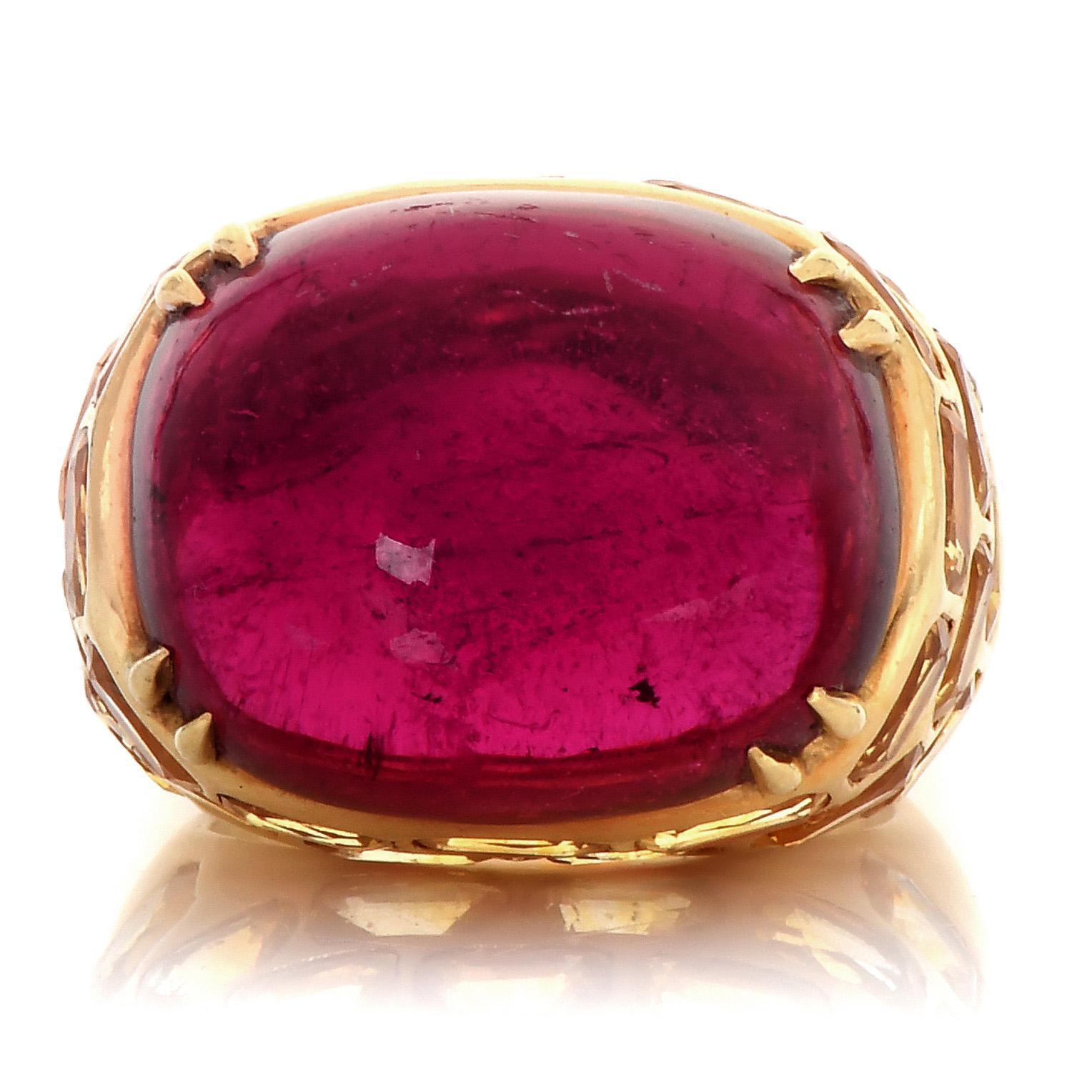 This high-quality Vintage Retro ring features a massive Rubellite tourmaline in a high-set cocktail ring. 

Inspired by a brick style, this piece is crafted in solid 18K Yellow Gold. Signed Lilli, a famous jewelry designer in Florida in the