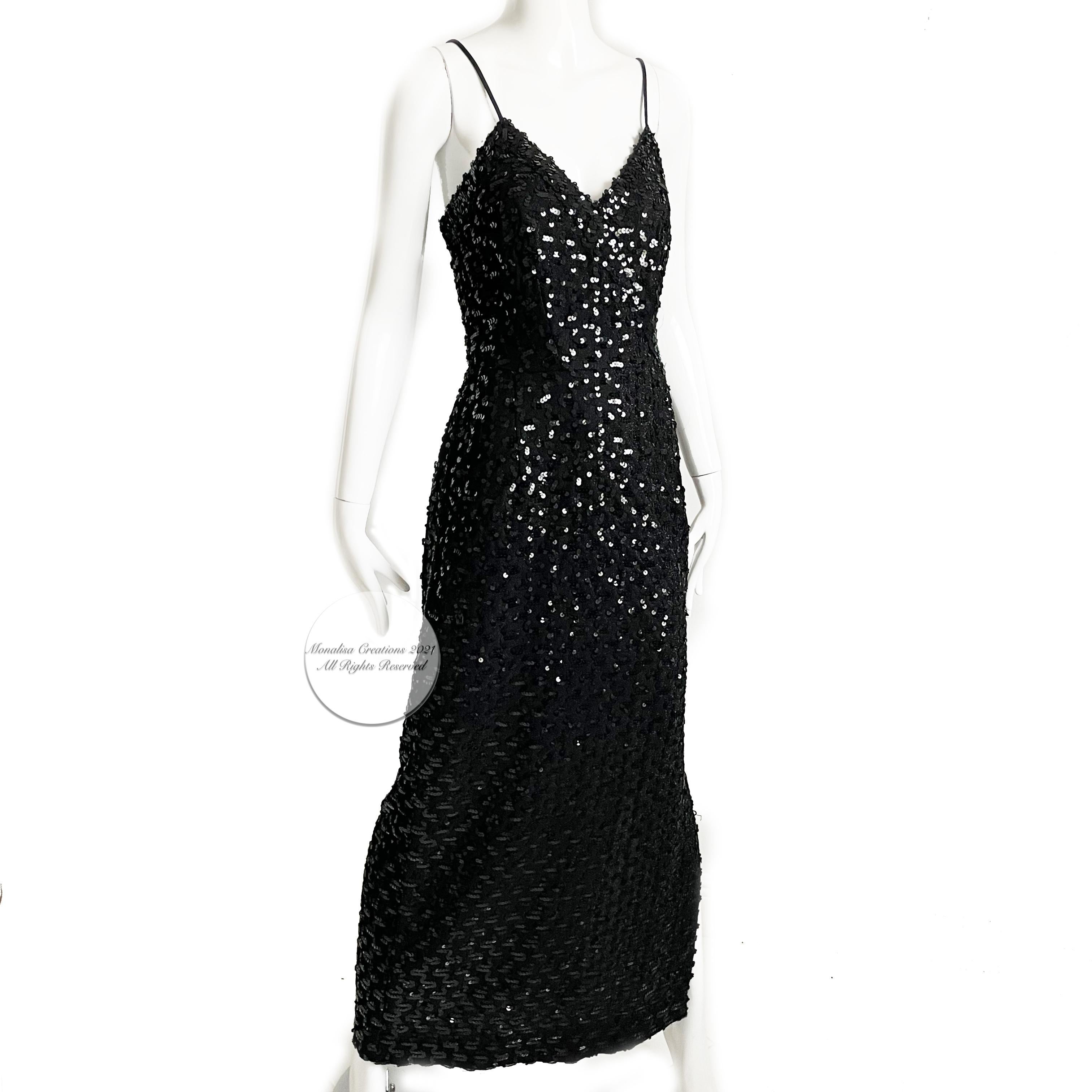 Sparkle alert! Here's a simple yet sexy evening gown by Lilli Diamond of California, likely made in the late 1970s. Made from a stretchy knit fabric with TONS of black sequins, this dress is cut to show off one's curves and features a side vent on