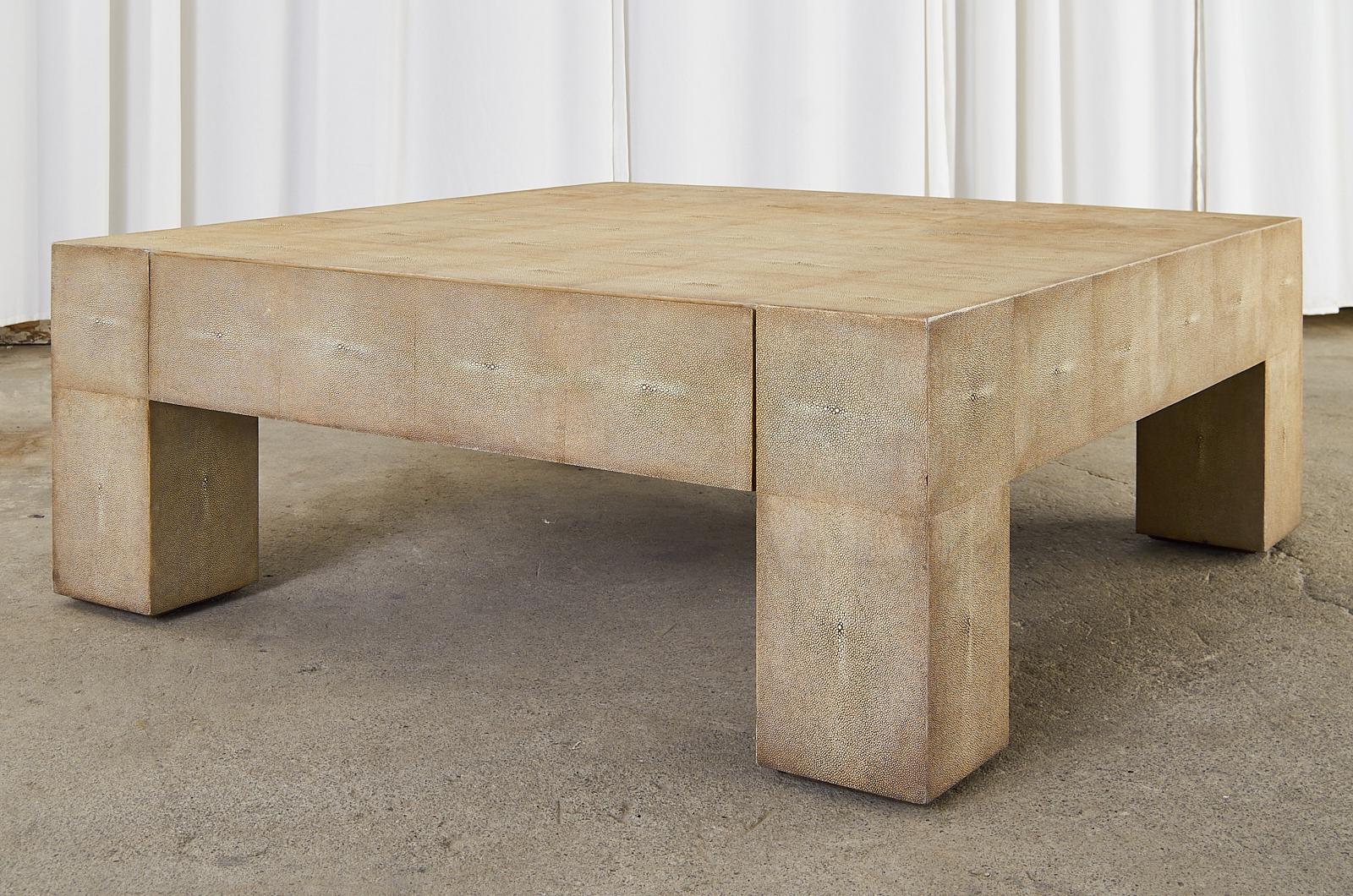 Dramatic and large square cocktail table or coffee table designed by Lillian August. The table features an oak frame clad in textural faux shagreen leather. Known as the 