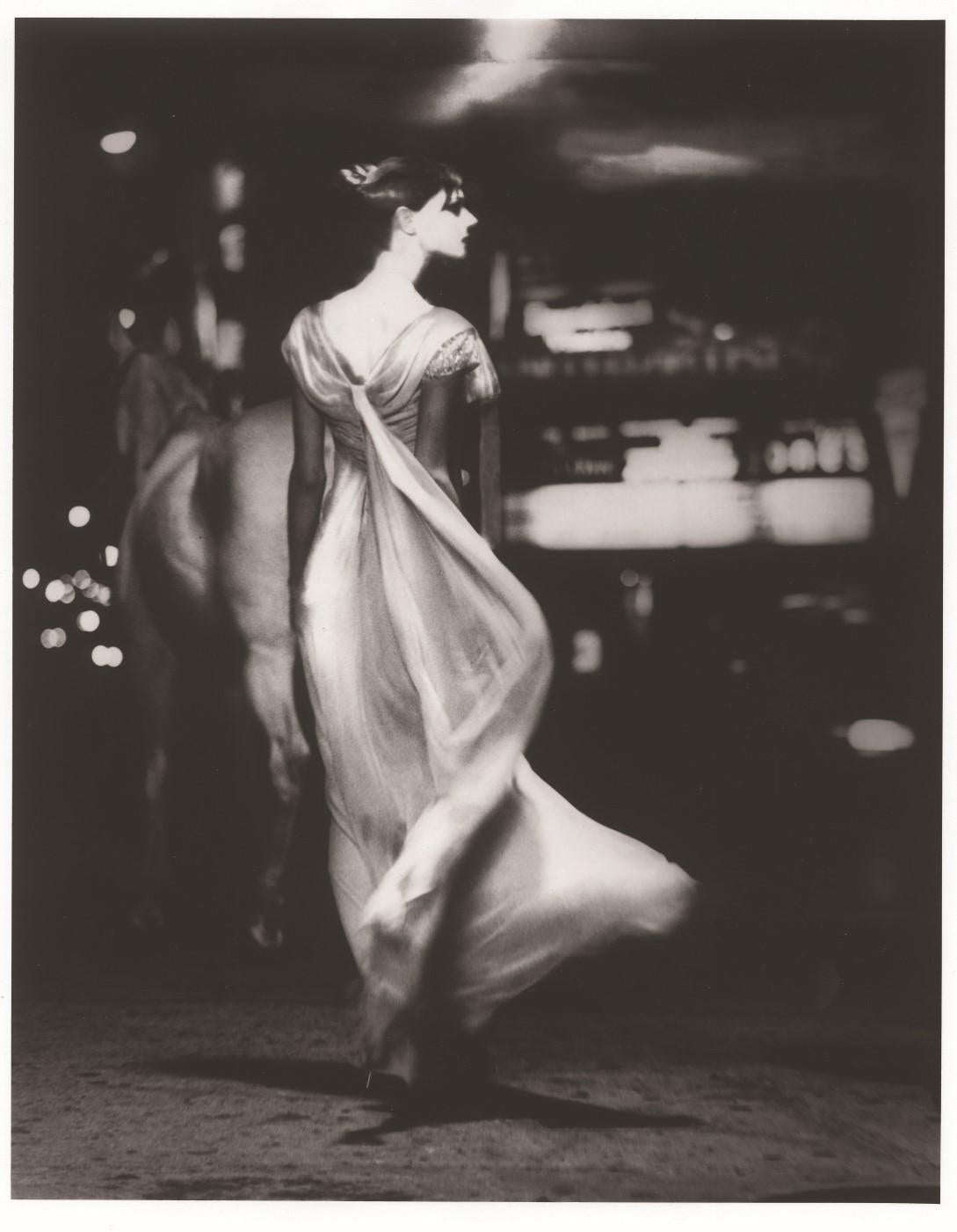 Lillian Bassman Black and White Photograph - Times Square: The Night Fantastic