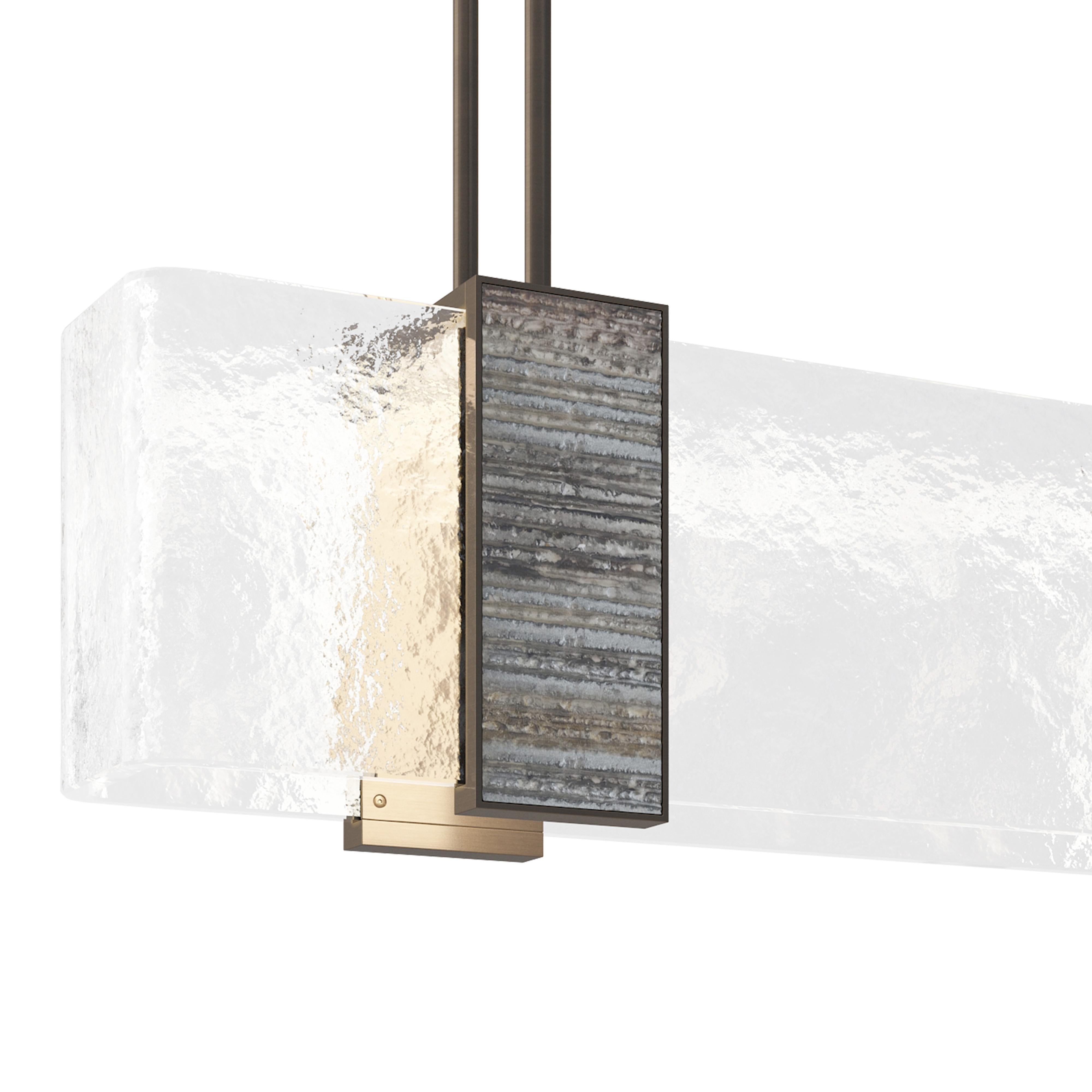 Lillian Gorbachincky's Limited edition Aurora light fixture featuring signature art glass, cast glass, and bronze designed and fabricated by Lillian Gorbachincky Atelier.

Overall dimensions: 72