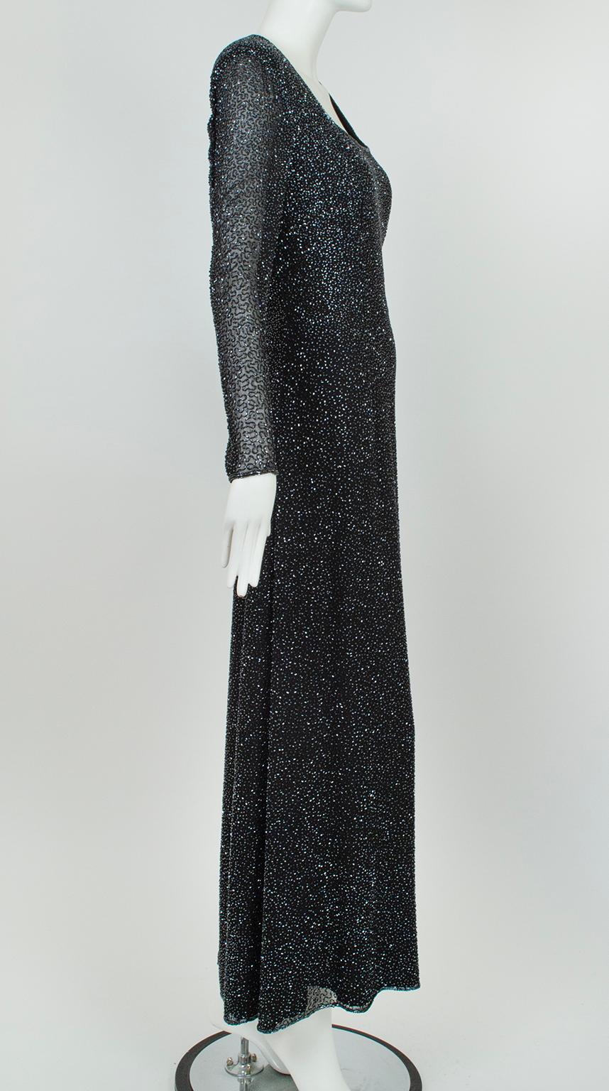 Exquisitely simple, this statuesque floor length gown pairs a minimalistic column silhouette with dazzling black aurora borealis bugle beads so the wearer—and not her dress—does the talking. A velvet hammer of an entrance for your next black tie