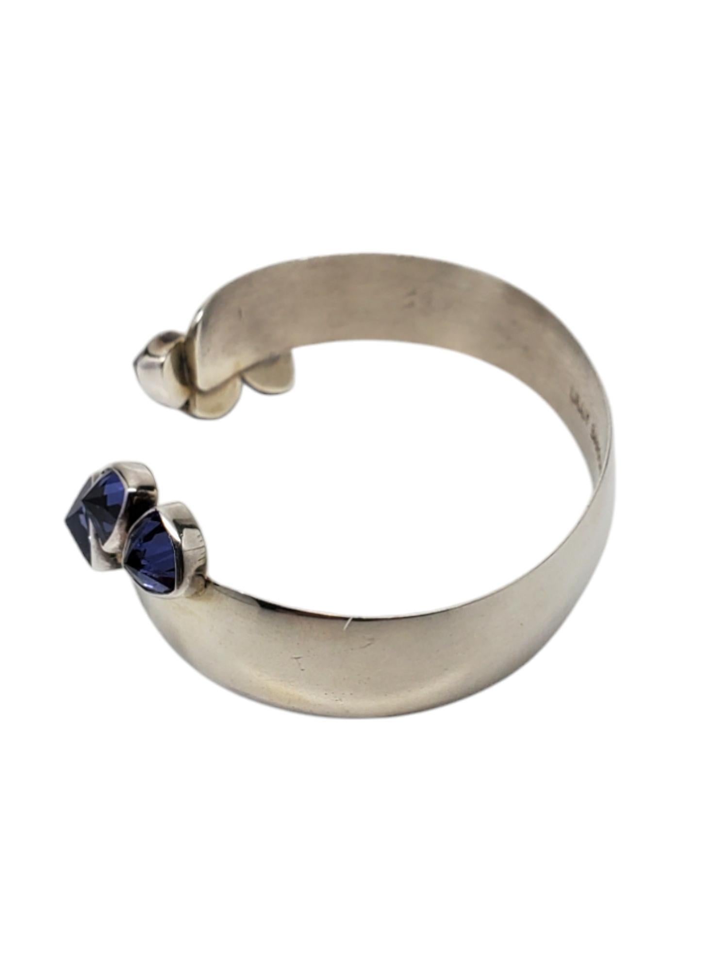 Lilly Barrack Sterling Silver Purple Gemstones Cuff Bracelet

This unique bracelet by Lilly Barrack Features 6 large purple gemstones set on a heavy sterling silver cuff.

Size: 6.5 in.

Stamped: LILLY BARRACK 925

Weigh: 21.7 dwt / 33.8 gr.

Very