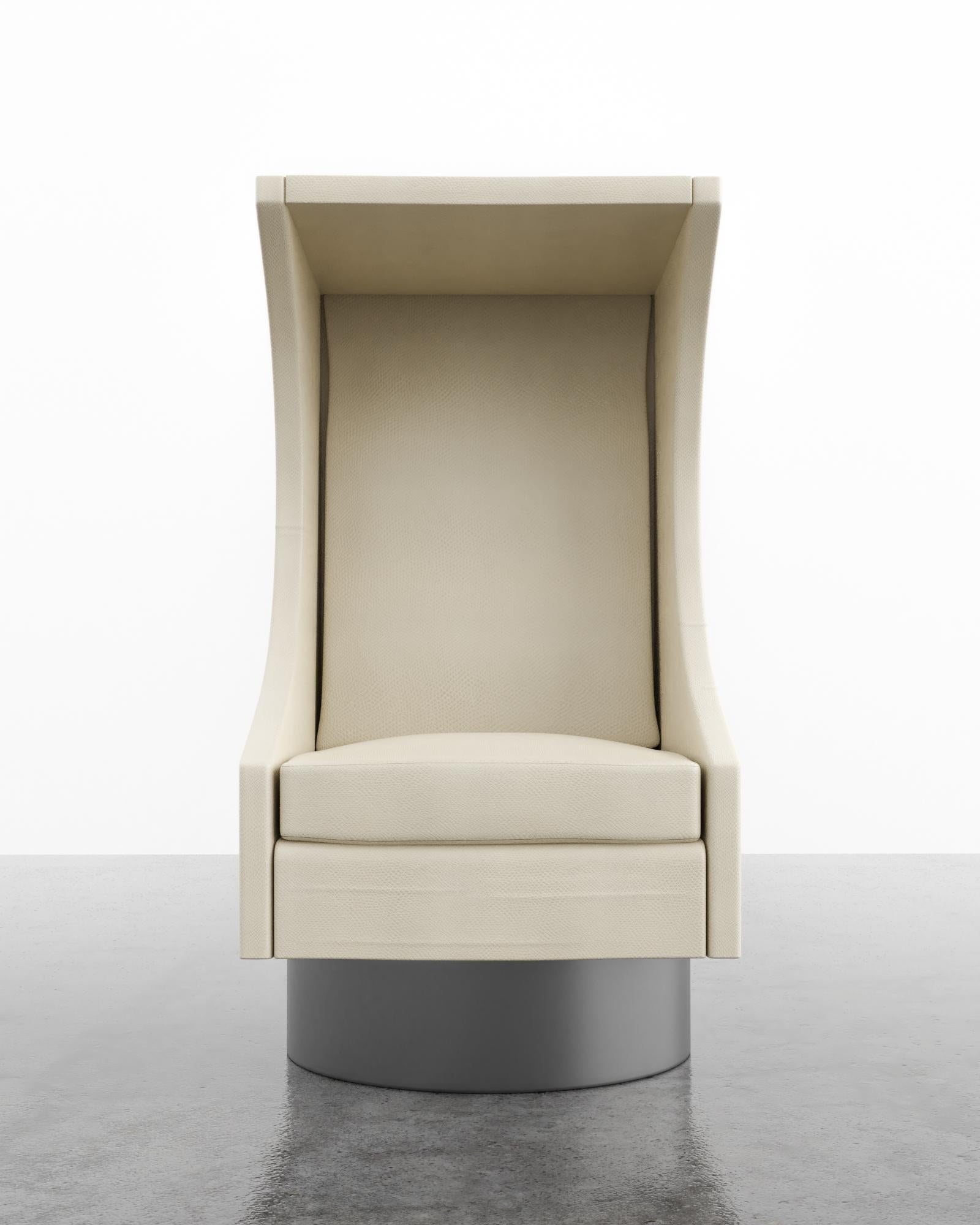 The Lilly chair is a modern clean version of the wing back chair. Fully custom and made to order in California. As shown in Kimodo lizard/cream $9,490. Starting at $7,910.