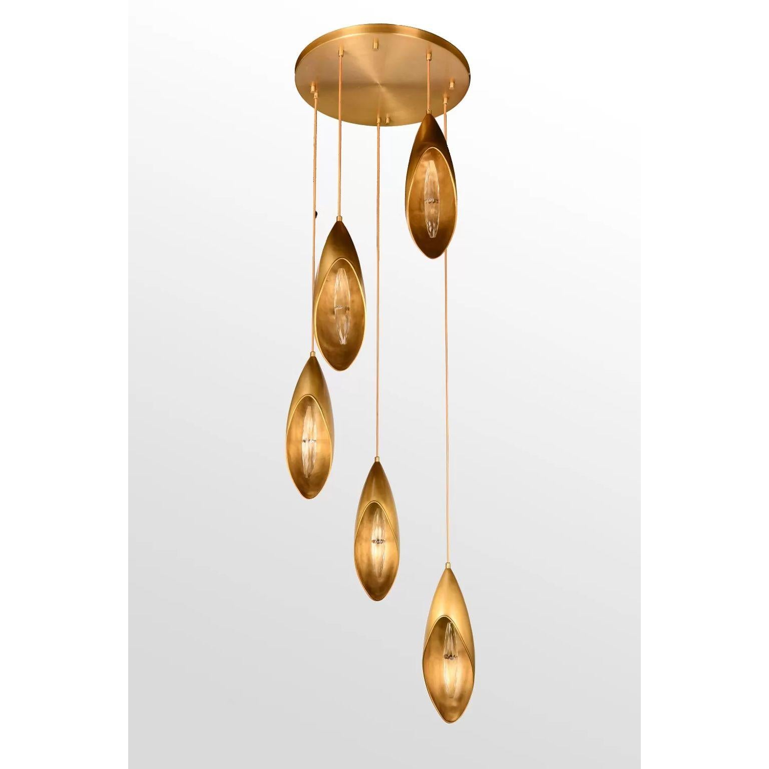 Lilly Chandelier by Dainte
Dimensions: Ø 50 x H 175 cm.
Materials: Crystal and brass. 

Lily flowers symbolize purity and devotion. The collection illustrates minimalistic and elegant silhouettes with complementary colors. The entire body is modeled