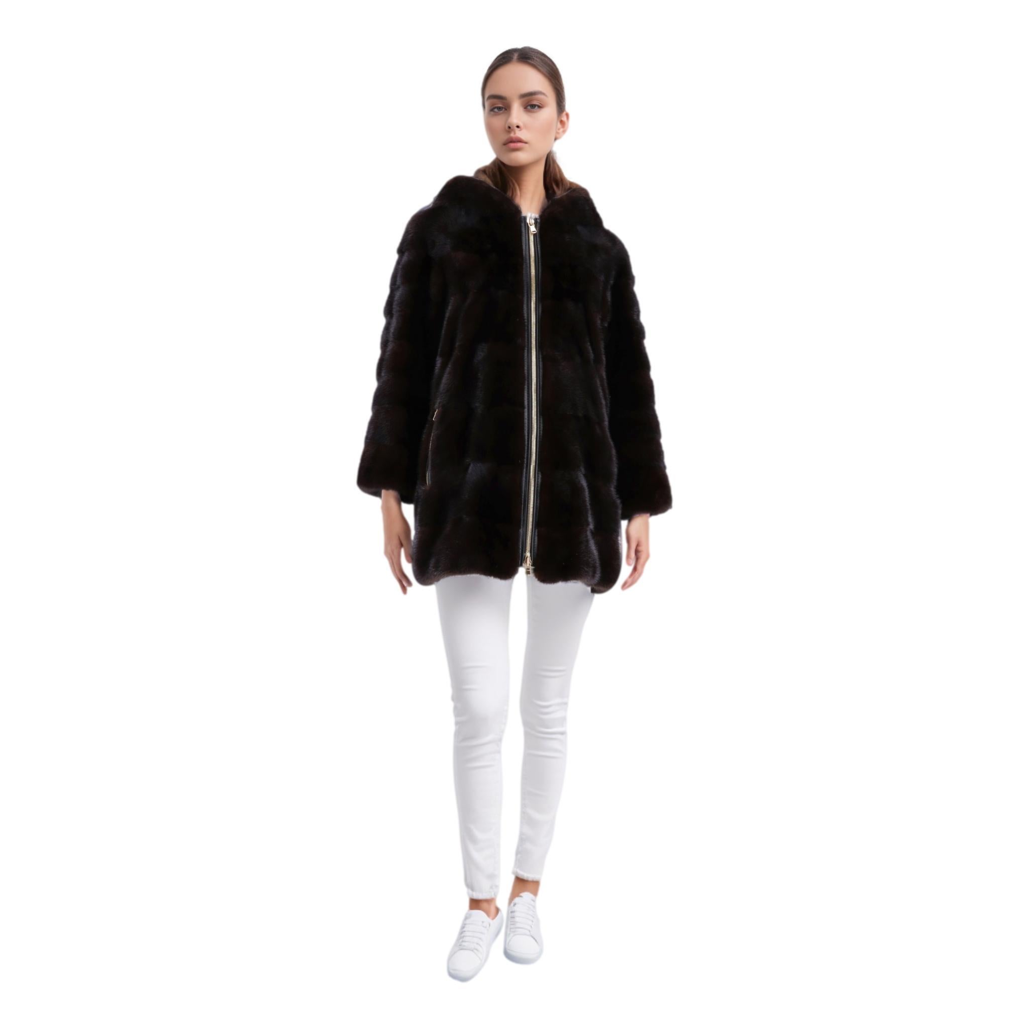 Limited Edition - Lilly E Violetta Hooded Mink Fur Coat

Dark brown coat crafted in glossy luxurious mink fur sourced by Copenhagen Furs.

Hooded and detailed with gold two-way zip closure along the centre and zipped cuffs with black leather