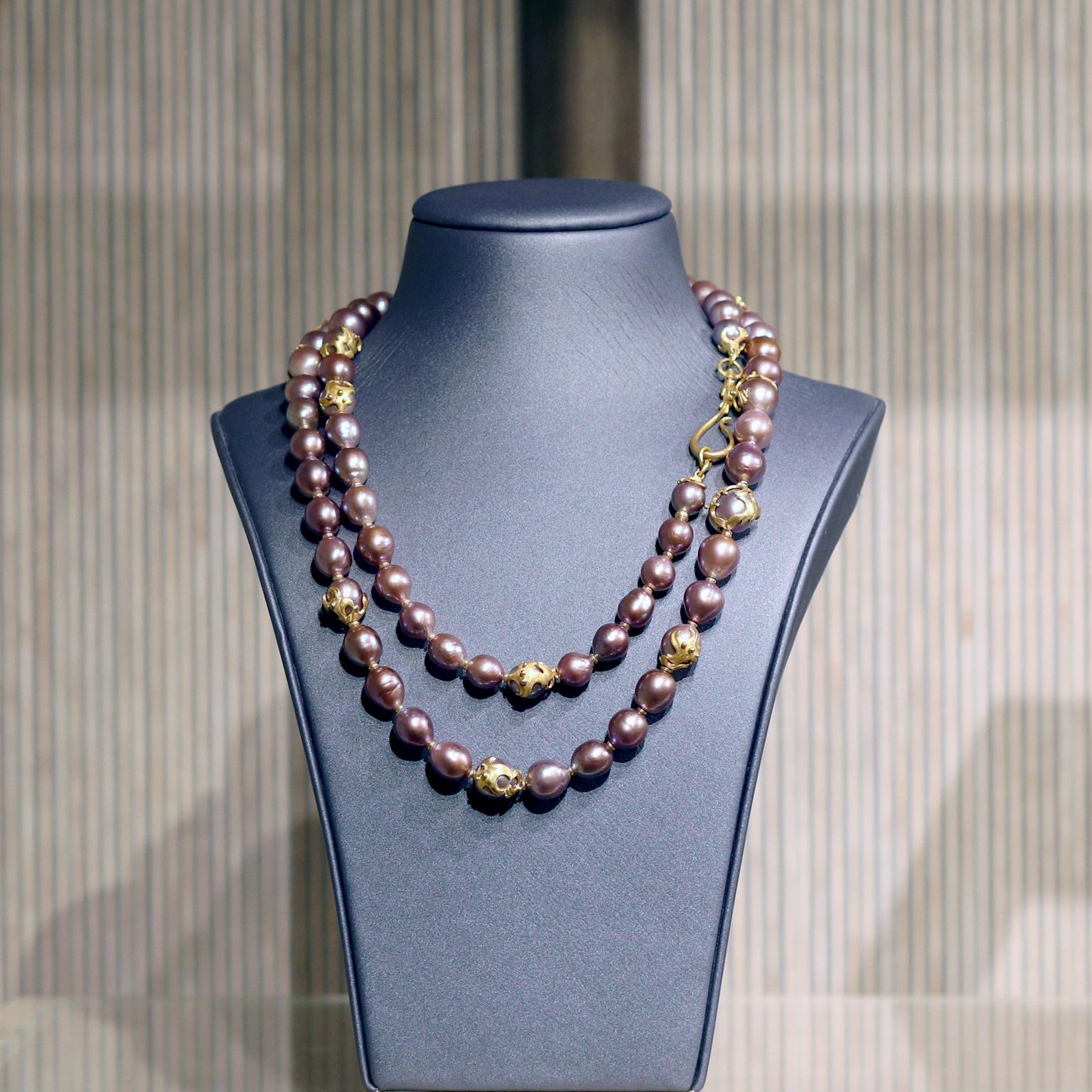 One of a Kind Opera Length Necklace hand-fabricated by acclaimed jewelry maker Lilly Fitzgerald showcasing a 40 inch long strand of natural, exceptional-quality Chinese Freshwater pearls with primary blue, violet, and pink tones complemented by