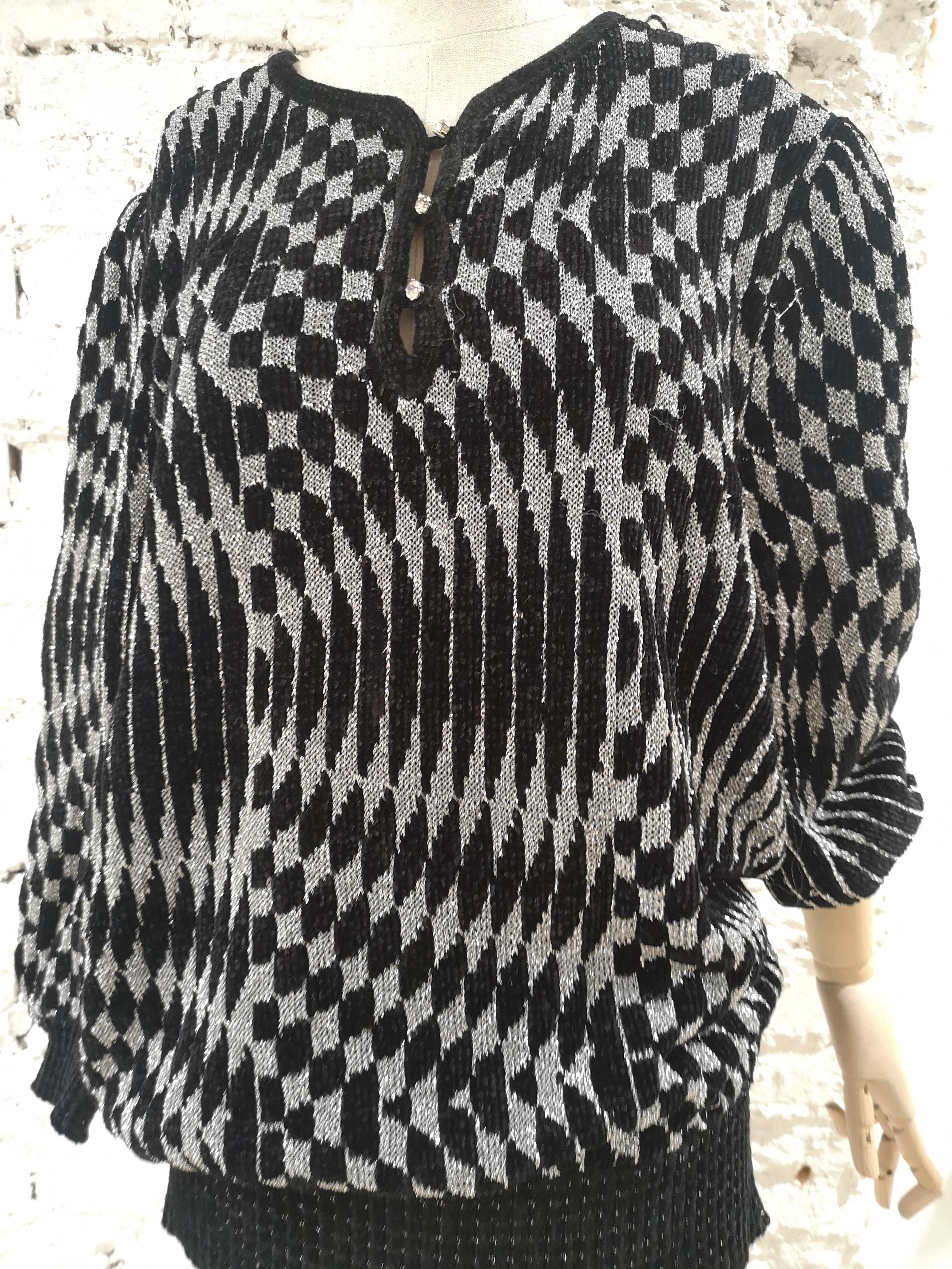 Lilly florence black and silver sweater
size L 