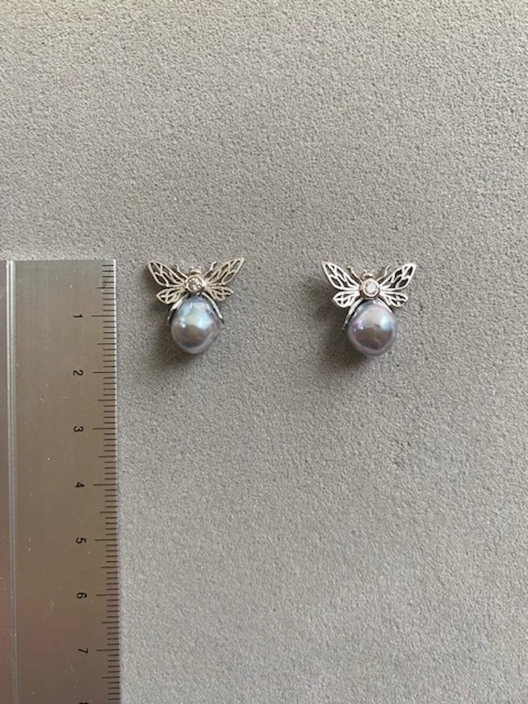 A pair of charming Akoya baroque Pearl earrings with Diamonds set in Platinum from Lilly Hastedt's Fauna Collection. The pearls are a stunning bluish grey with pink overtones.  The colour is all natural, not dyed. Whimsical studs for every day wear