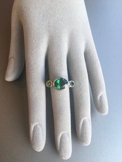 Green Tourmaline Three-Stone Ring in Platinum