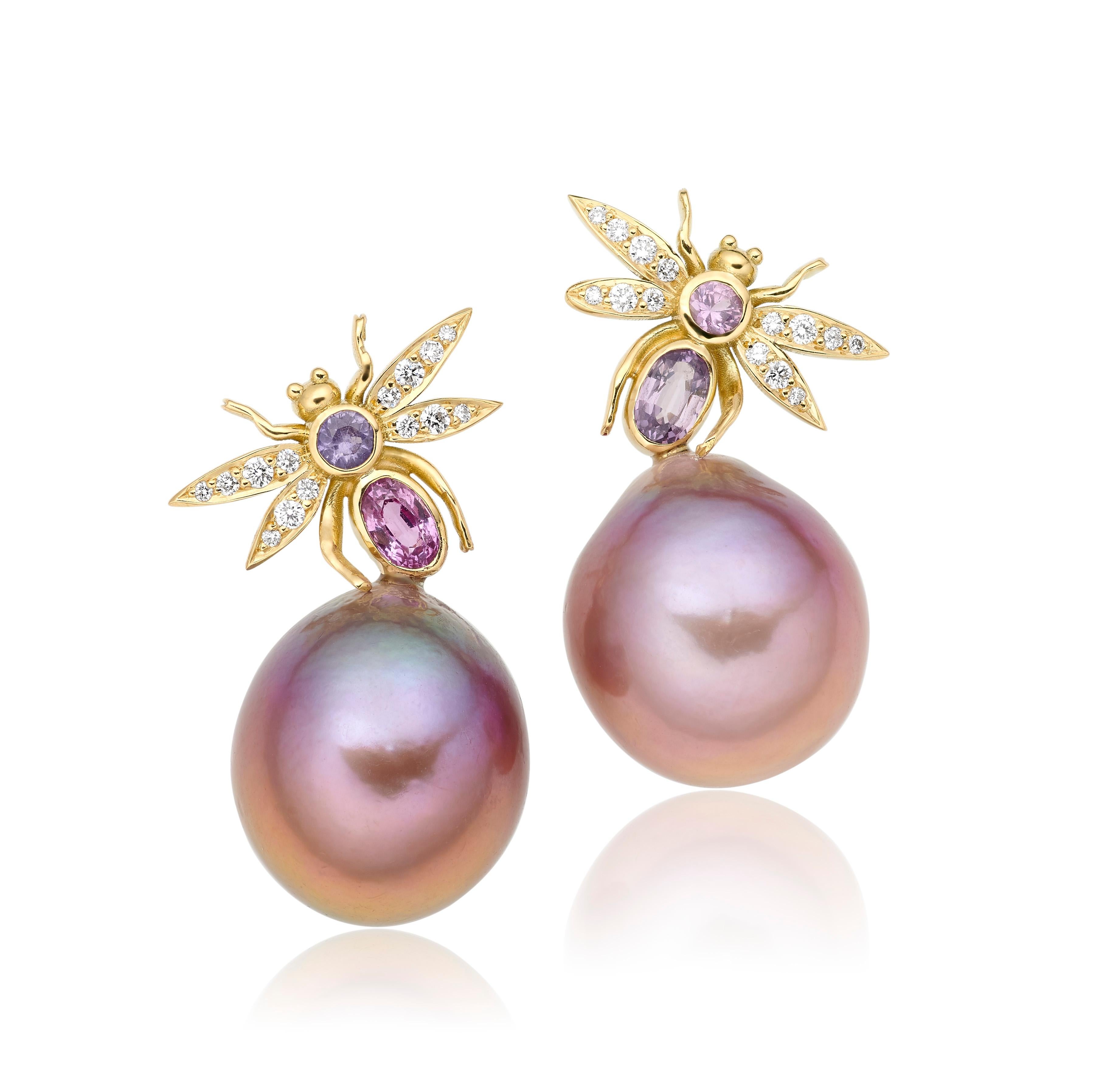 A pair of statement Pearl earrings from Lilly Hastedt's Fauna collection.  The insects are set with sparkling diamonds and lavender and pink Sapphires; finished off with a pair of deep lavender Freshwater Pearls. Set in 18 Karat gold.

Classic yet