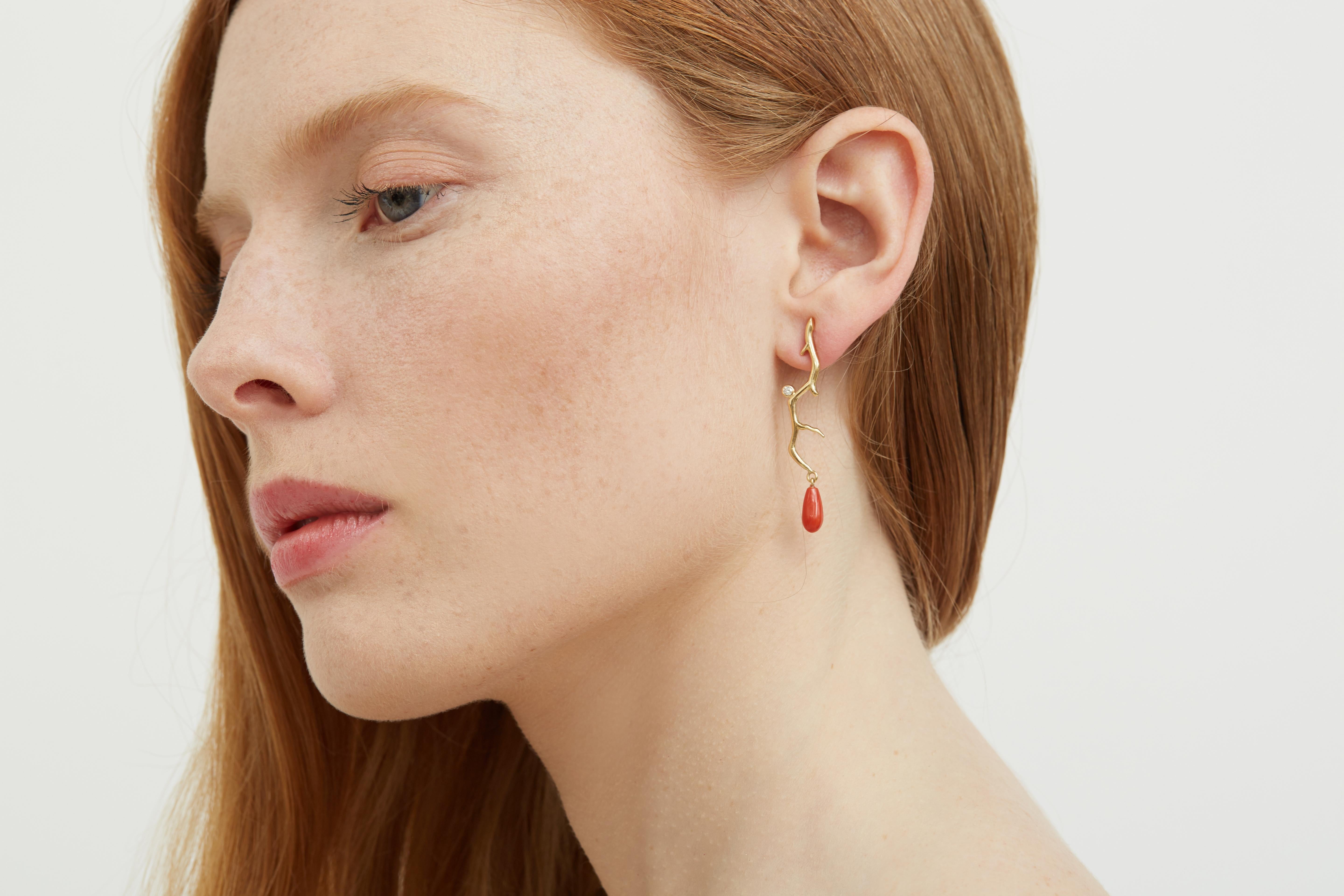 A Lilly Hastedt Signature pair of  earrings with Coral  and Diamonds in 18 Karat yellow Gold.  These earrings are based on coral twigs from Lilly's 