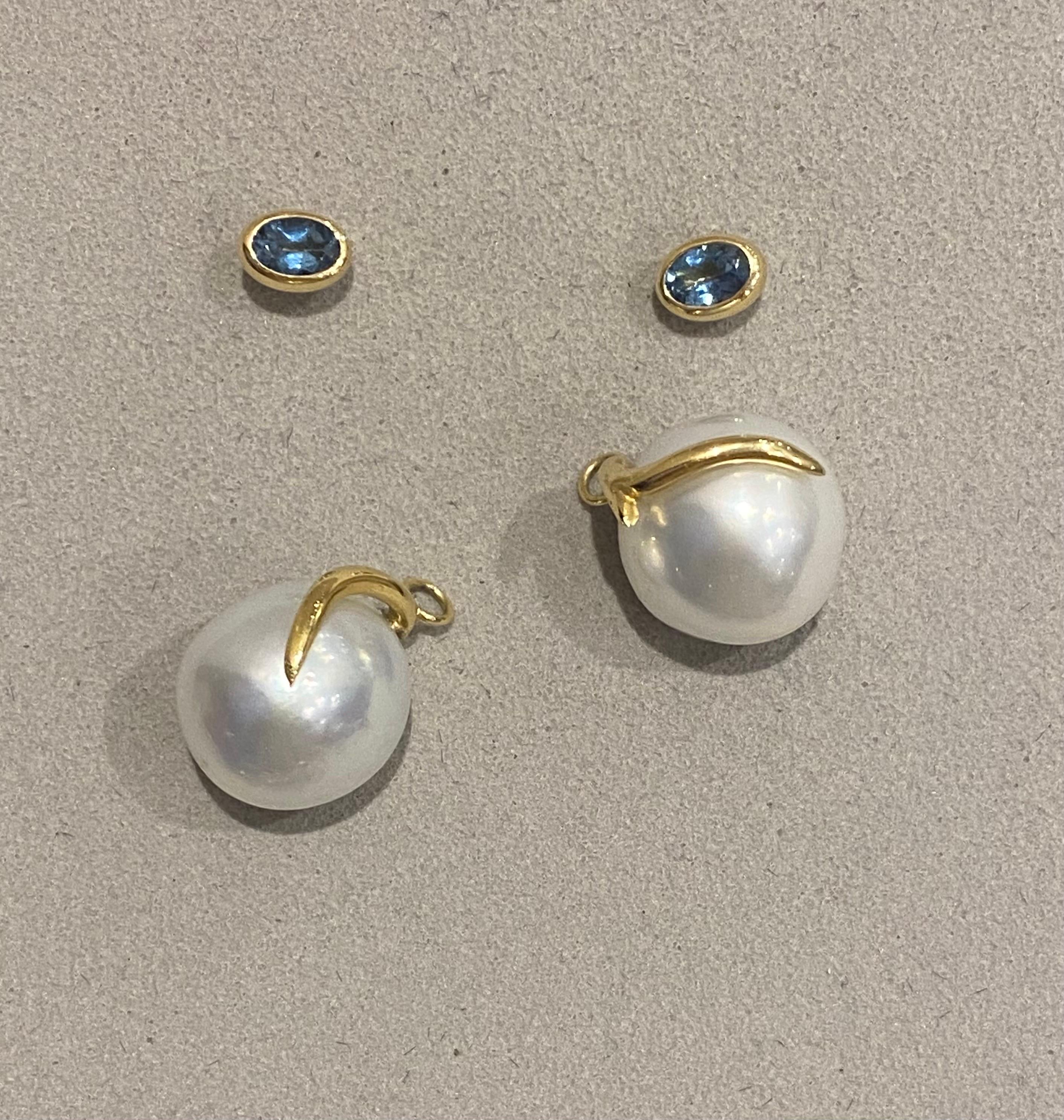 A Lilly Hastedt Signature pair of earrings with baroque South Sea Pearls and Santa Maria Aquamarines.  These earrings are in 18 Karat gold with an asymmetric design, from a collection inspired by coral twigs. The studs are detachable and can be worn