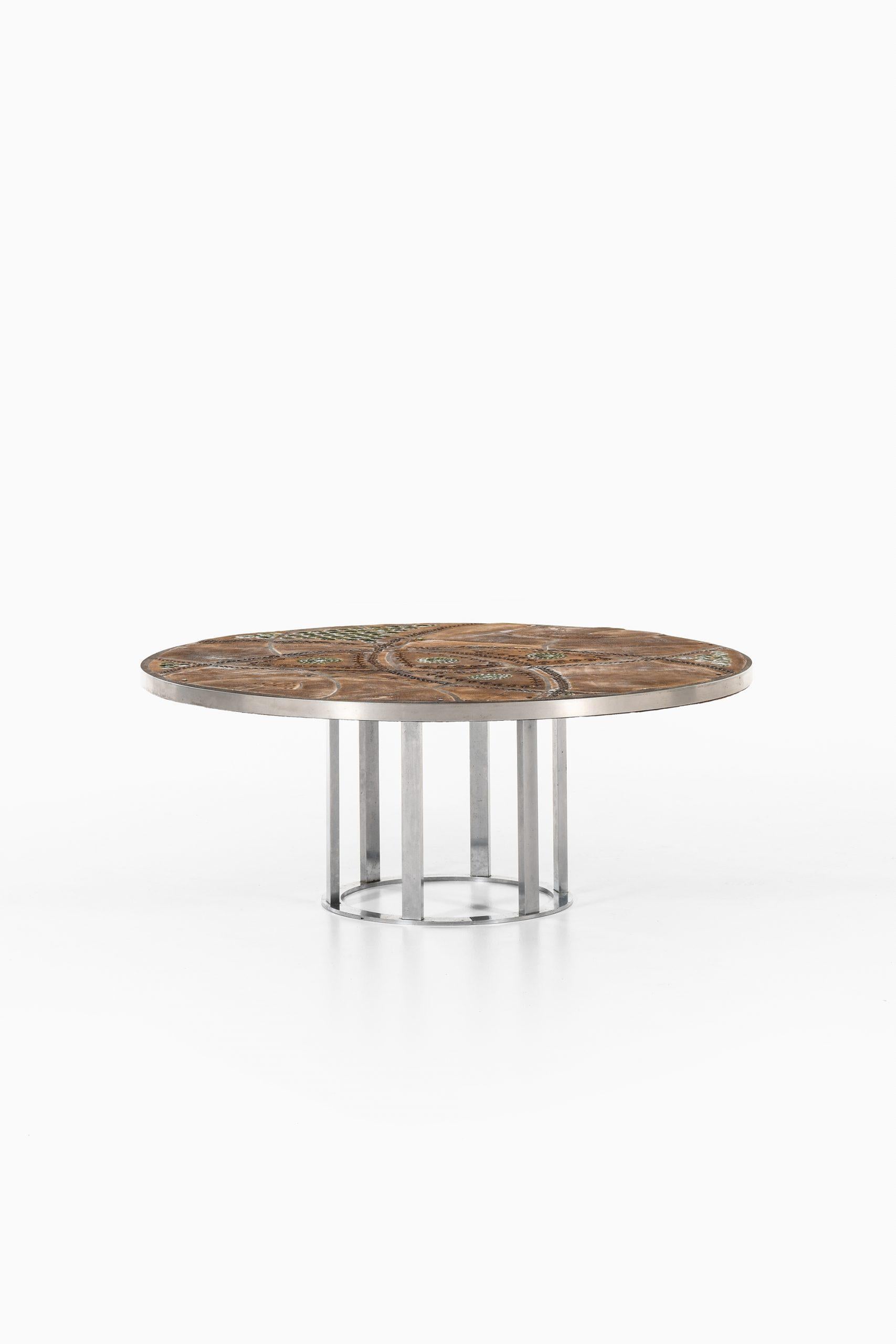 Rare Brutalist coffee table designed by Lilly Just Lichtenberg. Produced in Denmark.