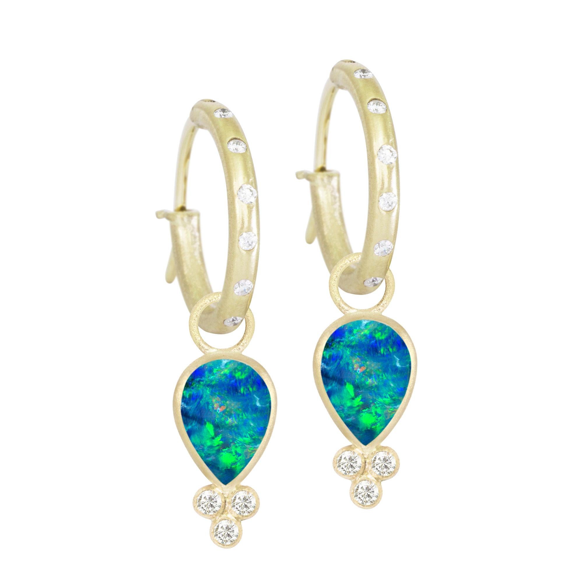 Designed with bezel-set opal stones, the diamond-accented Lilly Gold Charms embrace the shape of a drop of water—an essential element for life—and bring a little edge to any of our hoop styles.
Nina Nguyen Design's patent-pending earrings have an