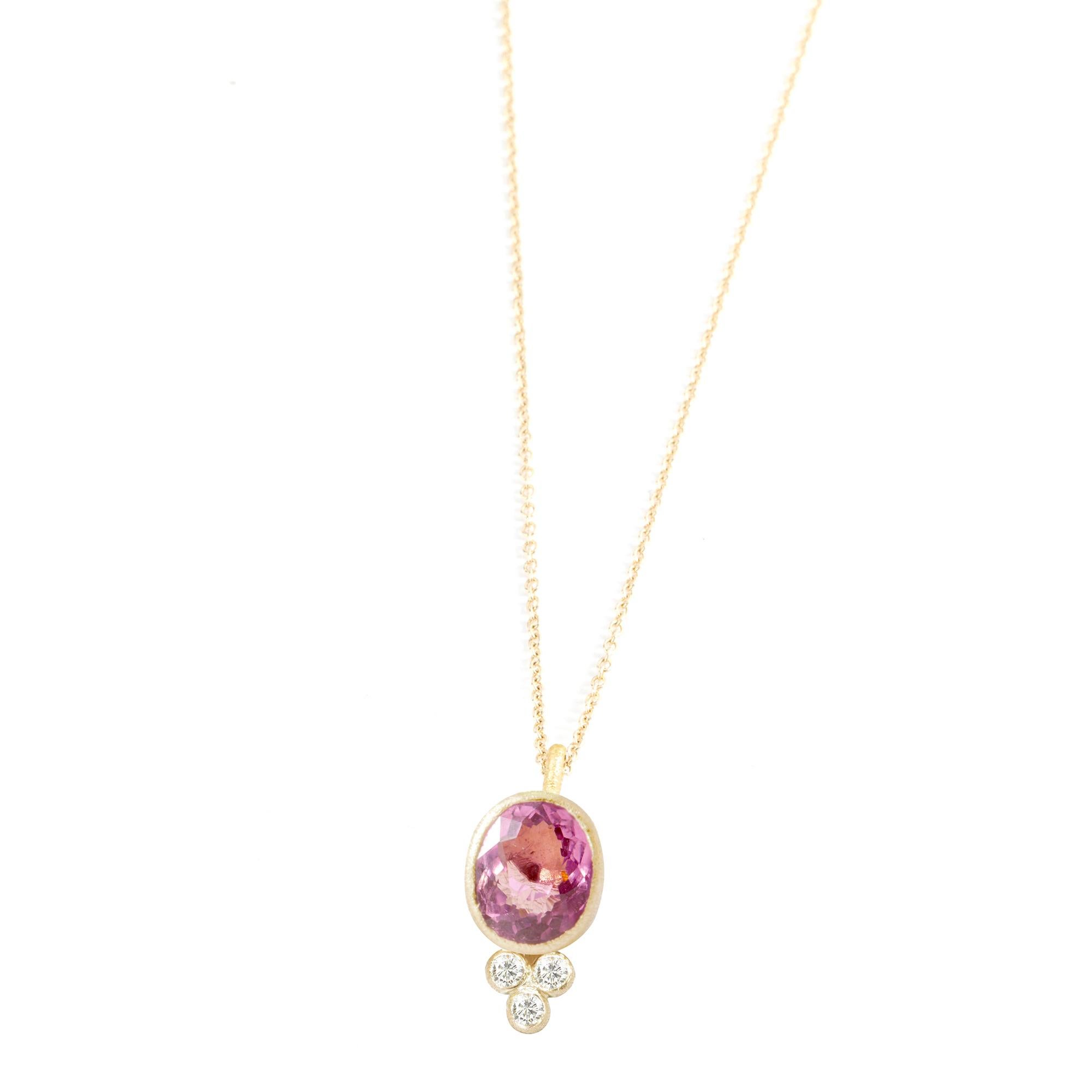With its single, bezel-set faceted pink tourmaline, the diamond-accented Lilly Gold Necklace is clean and elegant, and a very feminine style you can wear day in, day out.

Metal: 18K Yellow Gold
Stone carat: 1.2
Diamond carat: 0.0225
Length: