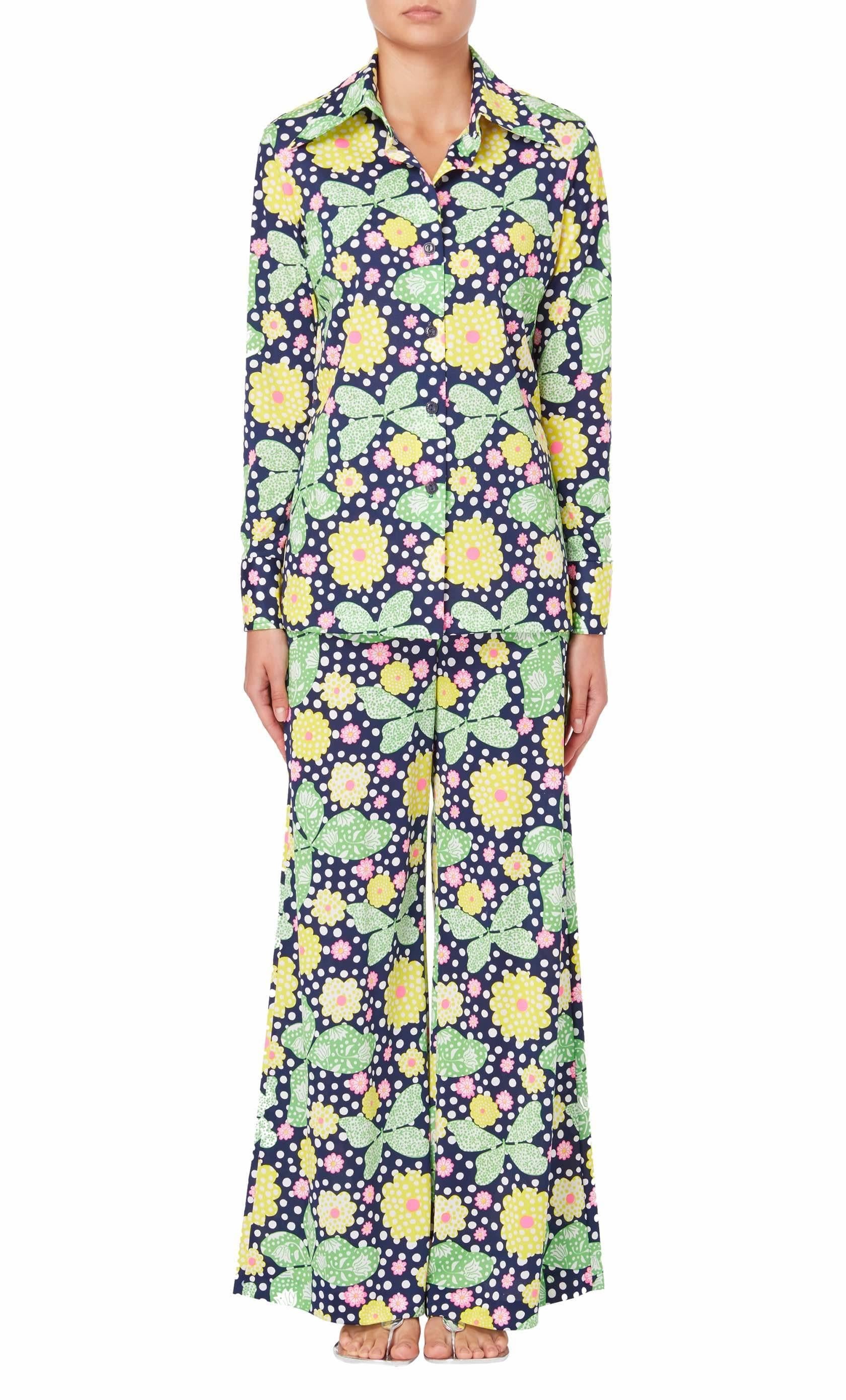 Floral printed ensemble by Lily Pulitzer, circa 1968. The ensemble with an all-over print comprises a shirt and matching high waisted, flared trousers.