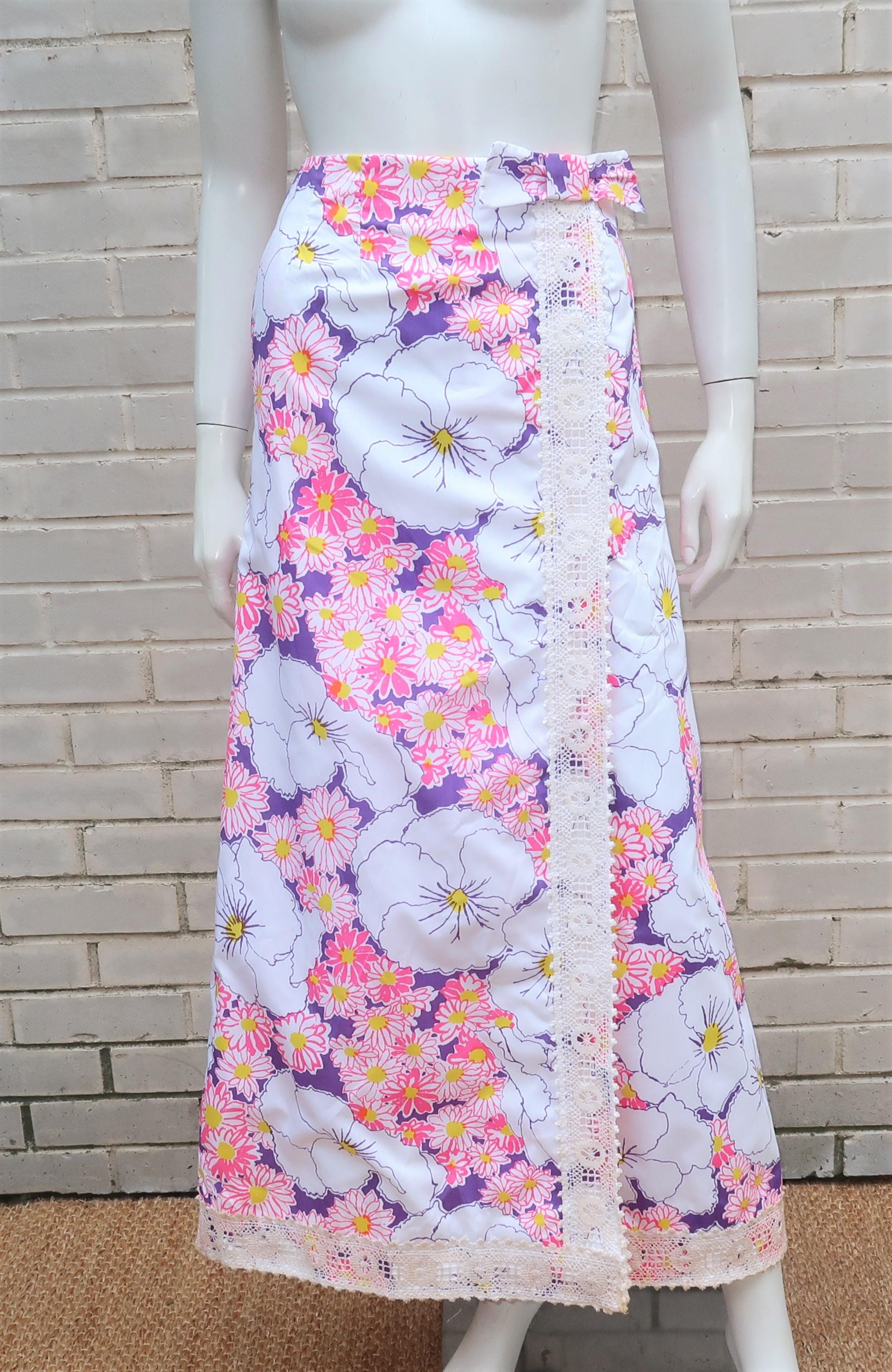 Flower power ... Lilly style!  1960's Lilly Pulitzer floral maxi skirt in shades of hot pink and purple with touches of yellow and white.  The skirt zips and hooks at the back with a bow accent, crochet lace trim down the front slit and hem and one