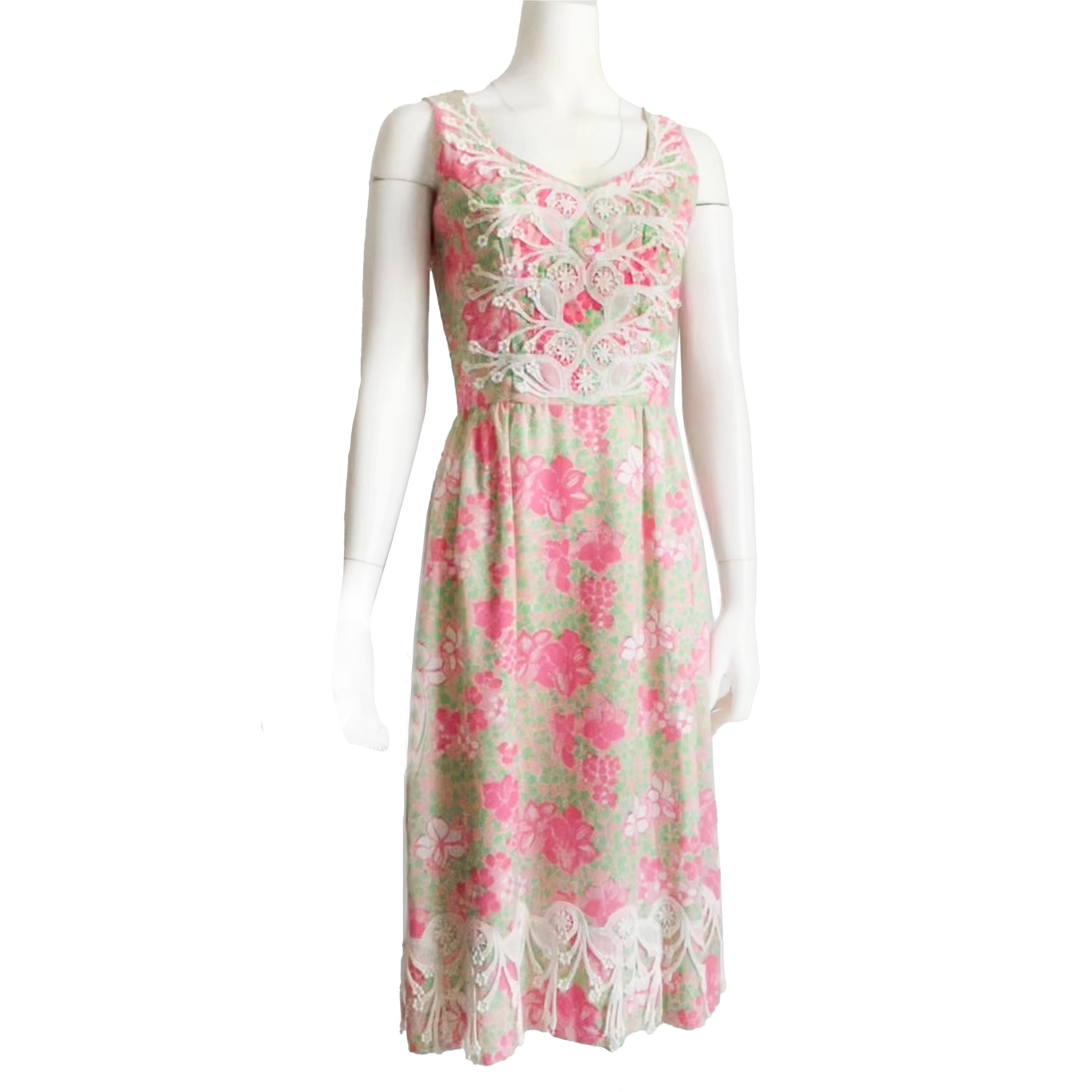 Authentic, preowned, vintage Original Lilly Pulitzer 'The Lilly' Dress with Lace, circa 1970s. Made from a gorgeous pink, green and white floral print, it has white lace at the bodice and trimming the skirt bottom hem! Fitted at the waist and flared