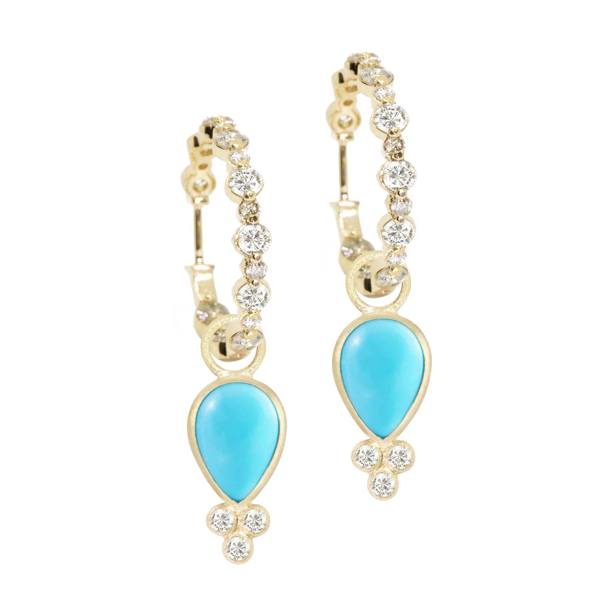 Designed with bezel-set sleeping beauty turquoise stones, the diamond-accented Lilly Gold Charms embrace the shape of a drop of water—an essential element for life—and bring a little edge to any of our hoop styles.
Nina Nguyen Design's