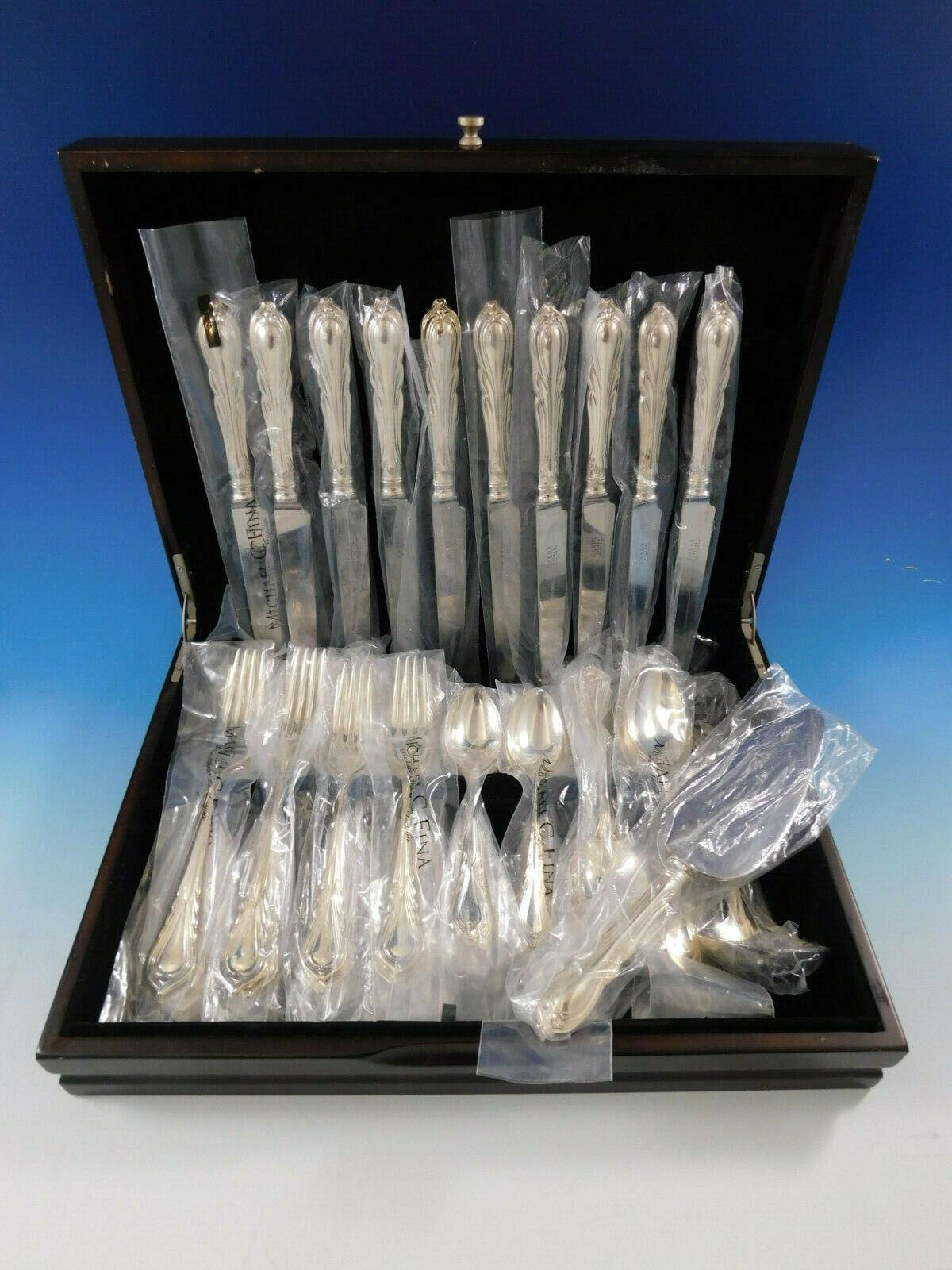 Lily by Carrs sterling silver dinner size flatware set, new in factory sleeves - 52 pieces. This set includes:

10 dinner knives, 9 7/8