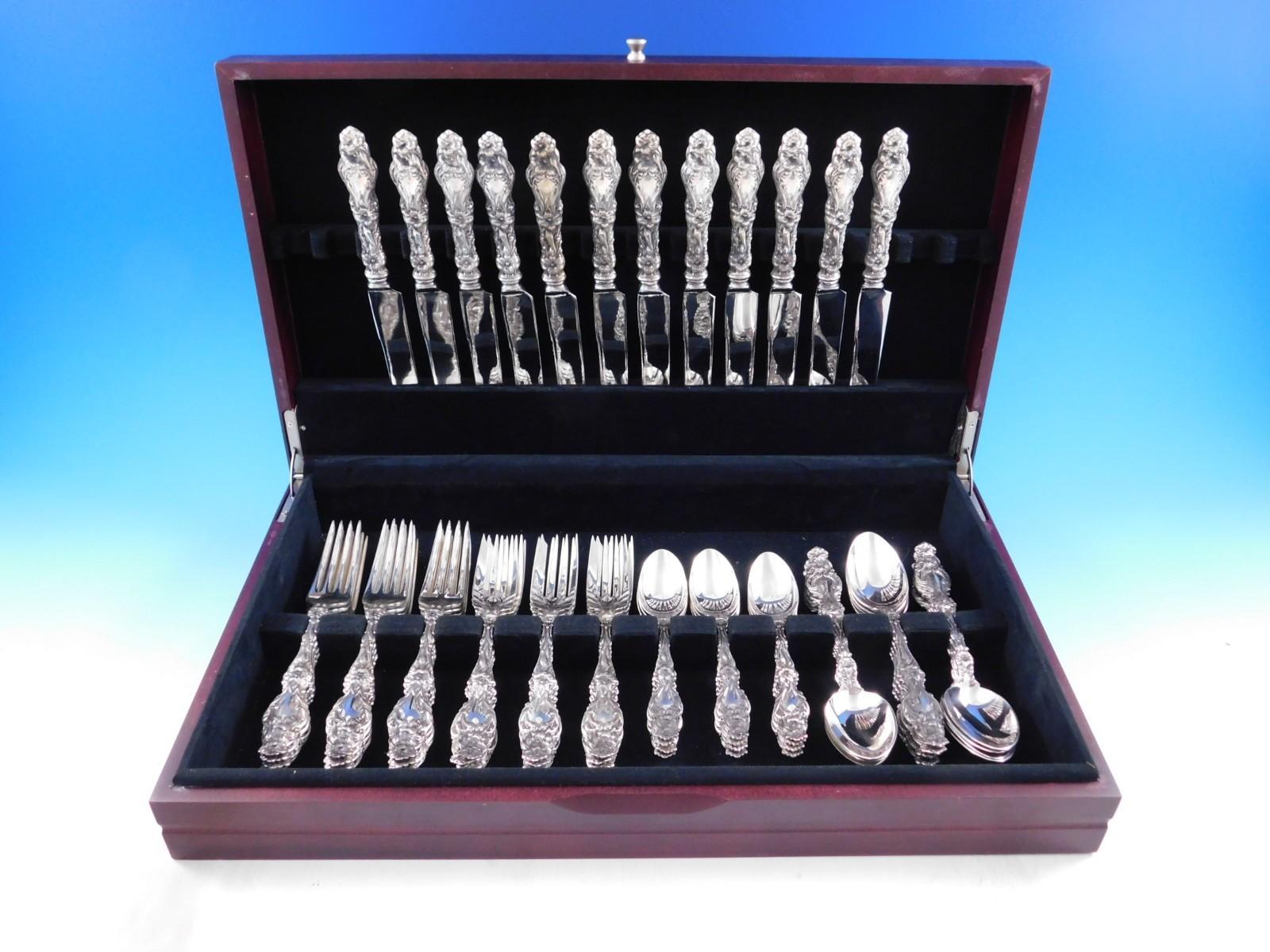 Beautiful Dinner Size Lily by Gorham sterling silver flatware set - 60 pieces. This set includes:

12 Dinner Size Knives w/Old French stainless blades, 9 1/2