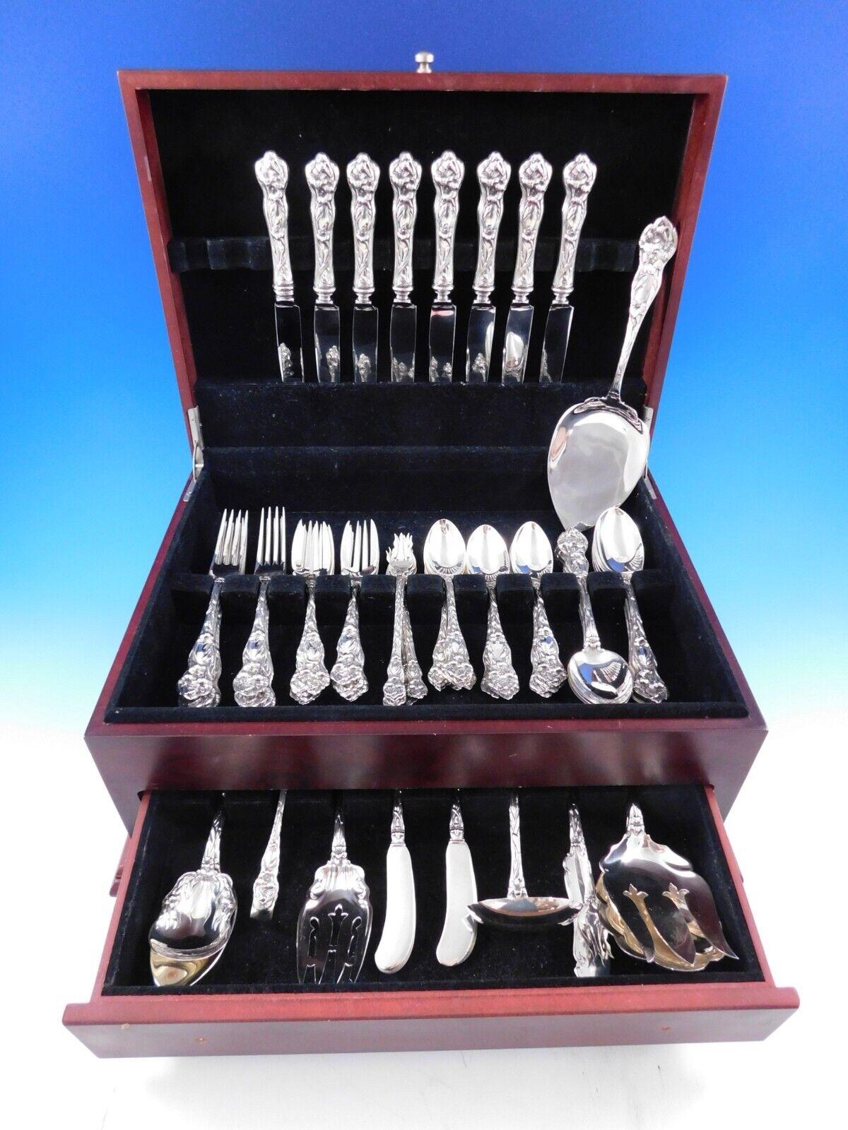 Rare Lily by Watson, c1902, service de couverts en argent sterling, 73 pièces. Cet ensemble comprend :

8 Couteaux ordinaires, 9
8 fourchettes ordinaires, 7