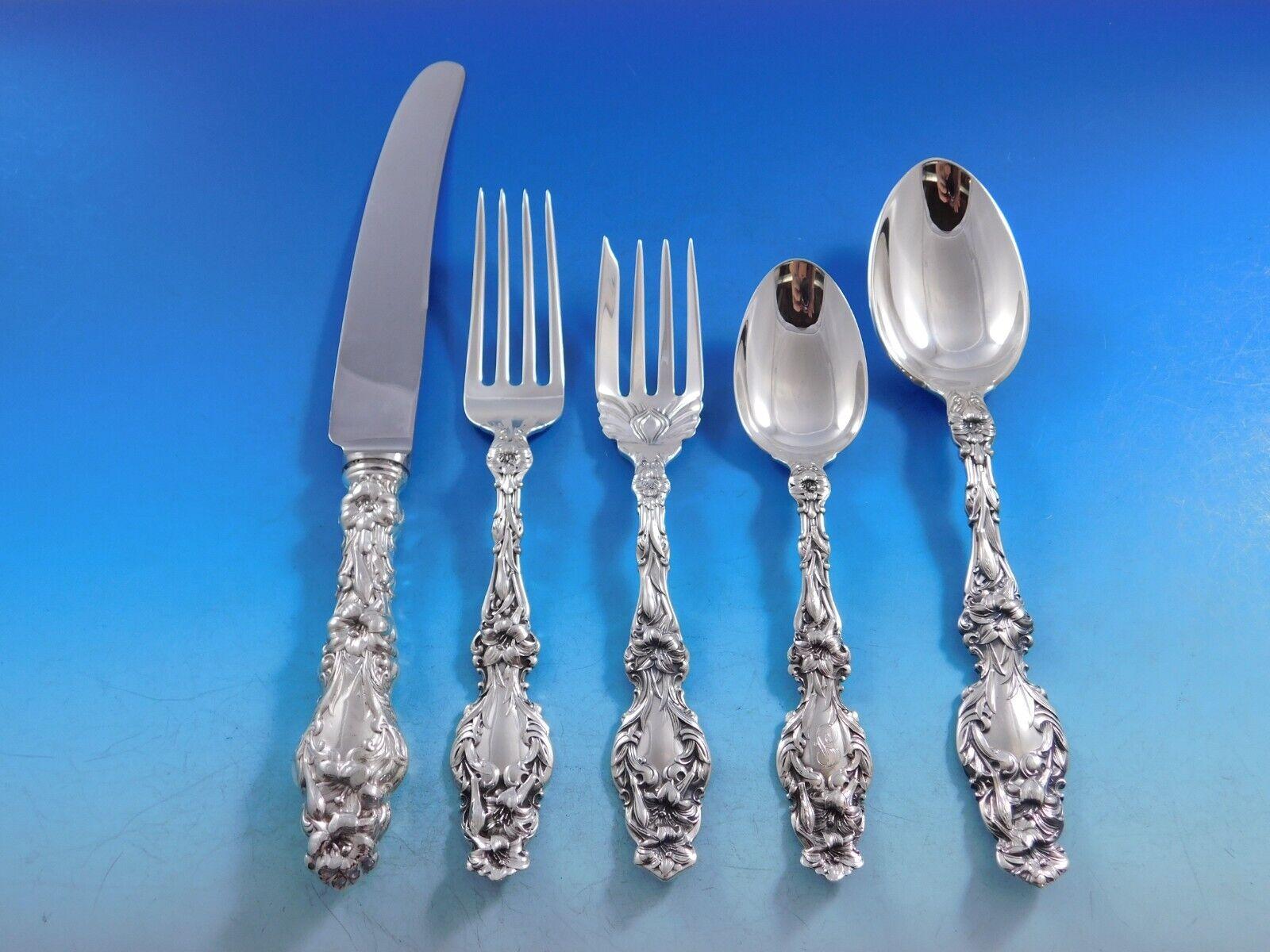 Beautiful Lily by Whiting Sterling Silver Flatware set - 62 pieces. This set includes:

12 Knives with French stainless blades, 9
