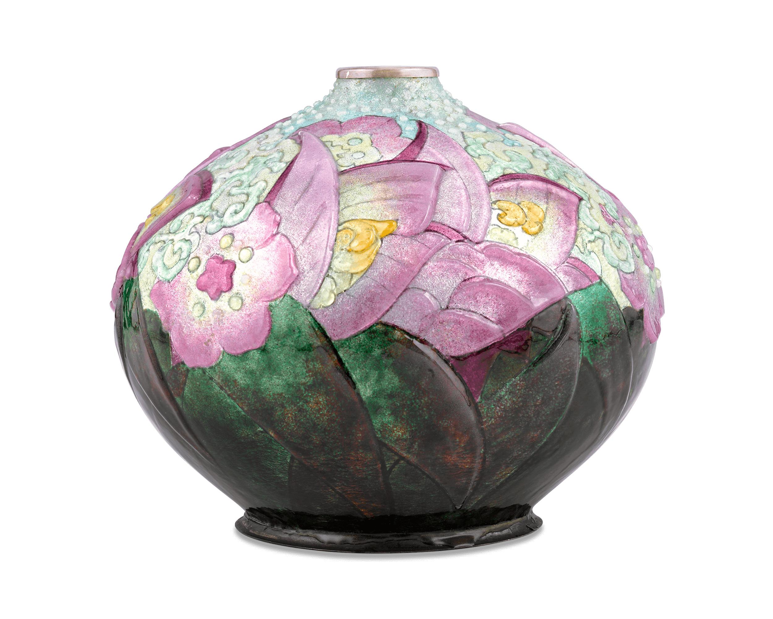 This rare and delicate enameled vase is a testament to the exceptional artistry of Camille Fauré. The rounded form of this piece is made from copper that has been hand-enameled with luminous, incandescent greens, yellows and purples to delightful