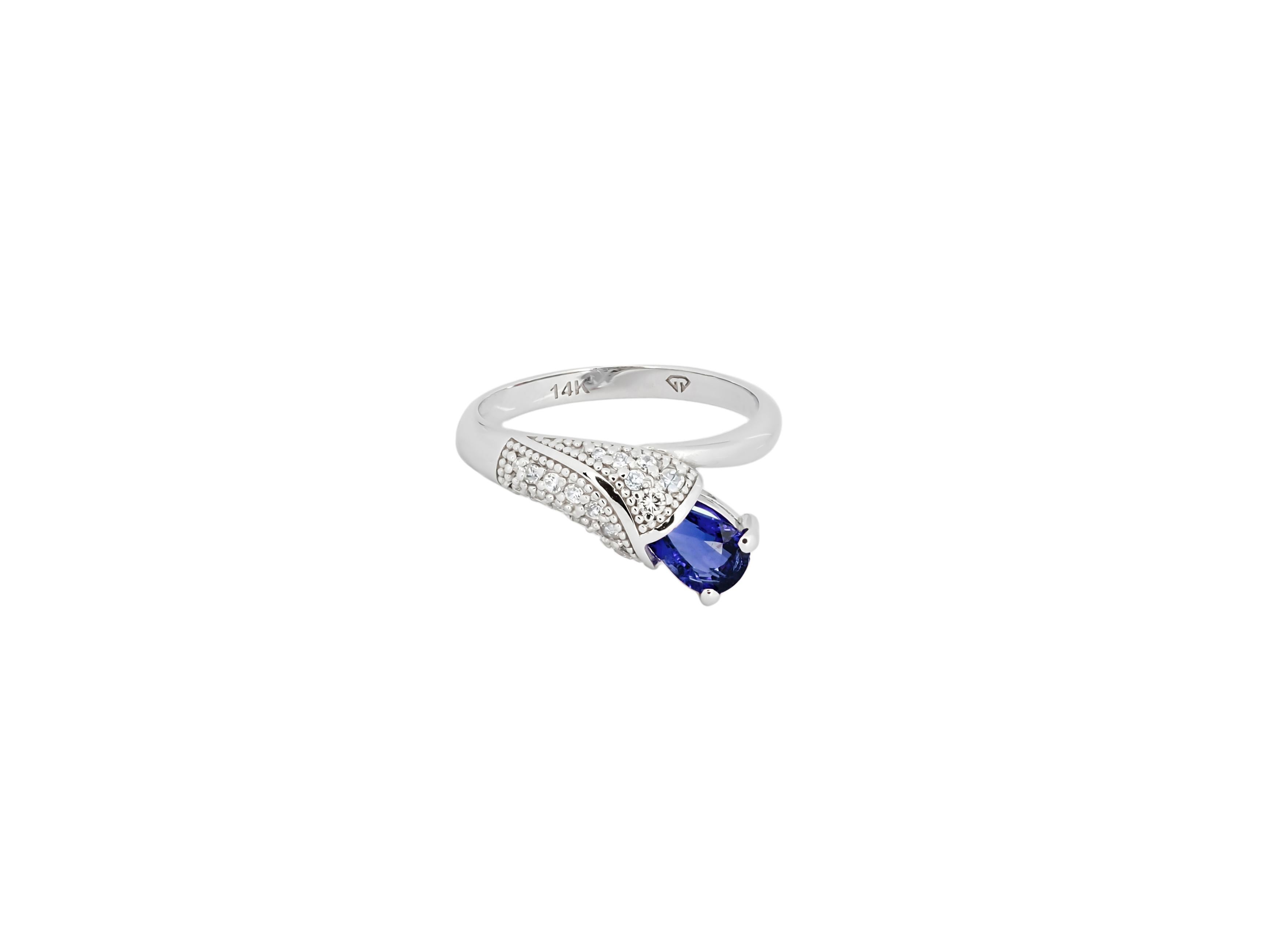 Pear sapphire 14k gold ring.Blue gemstone gold ring. September birthstone ring. Blue sapphire ring.
Lily flower gold ring with sapphire.

14 ct gold
Weight: 2.5 gr depends from size
Set with sapphire, color blue
Pear cut, apx 1 ct
Clarity: