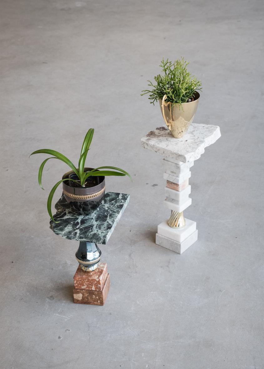 The lily flower Pot by Flétta
Dimensions: 54.5 x 40 cm
Materials: white marble, gold

Trophy is a collection of tables, lights, flowerpots and shelves made of old trophies collected from athletes and sports clubs in Iceland. Trophies are a part