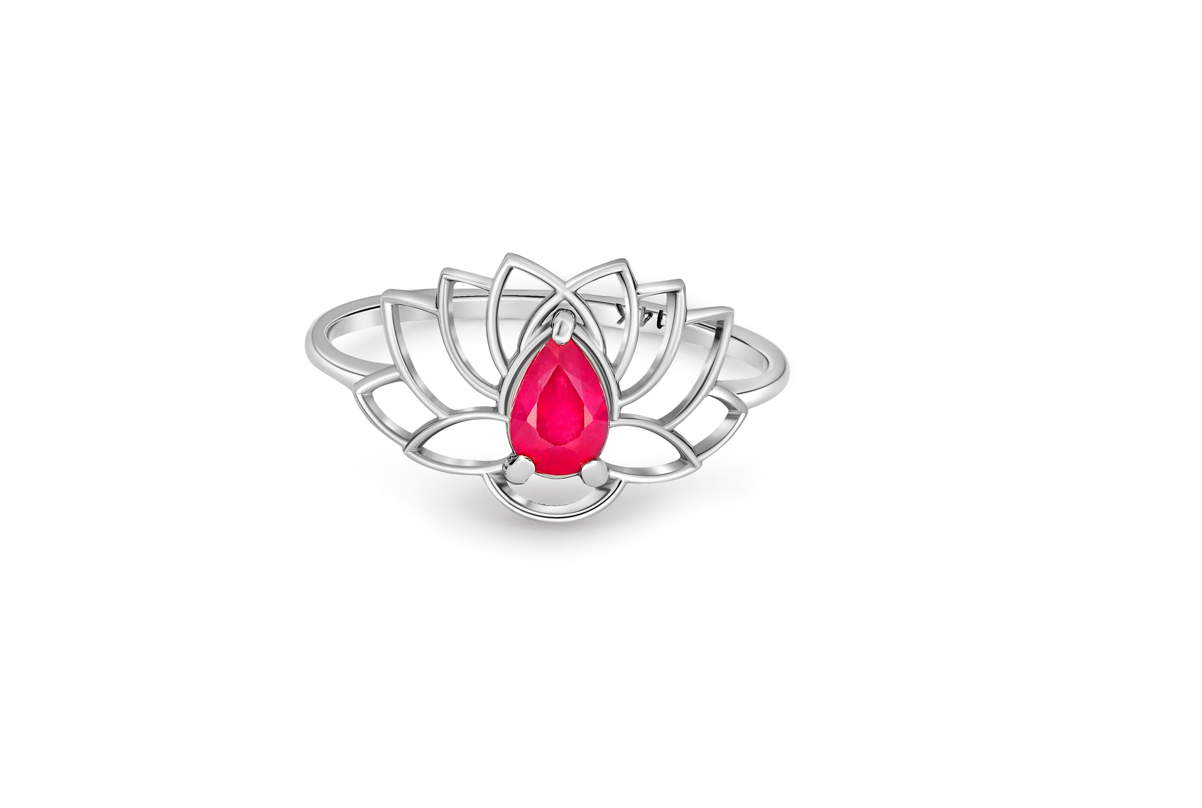 Lily ring with ruby in 14k gold. 
Genuine pear Ruby ring. Pear ruby ring. Water lily gemstone ring. July bithstone ring. Flower ruby ring.

Metal: 14k gold
Weight: 1.75 g. depends from size.

Ruby: color - pinkish red
Pear cut, 0.55 ct.