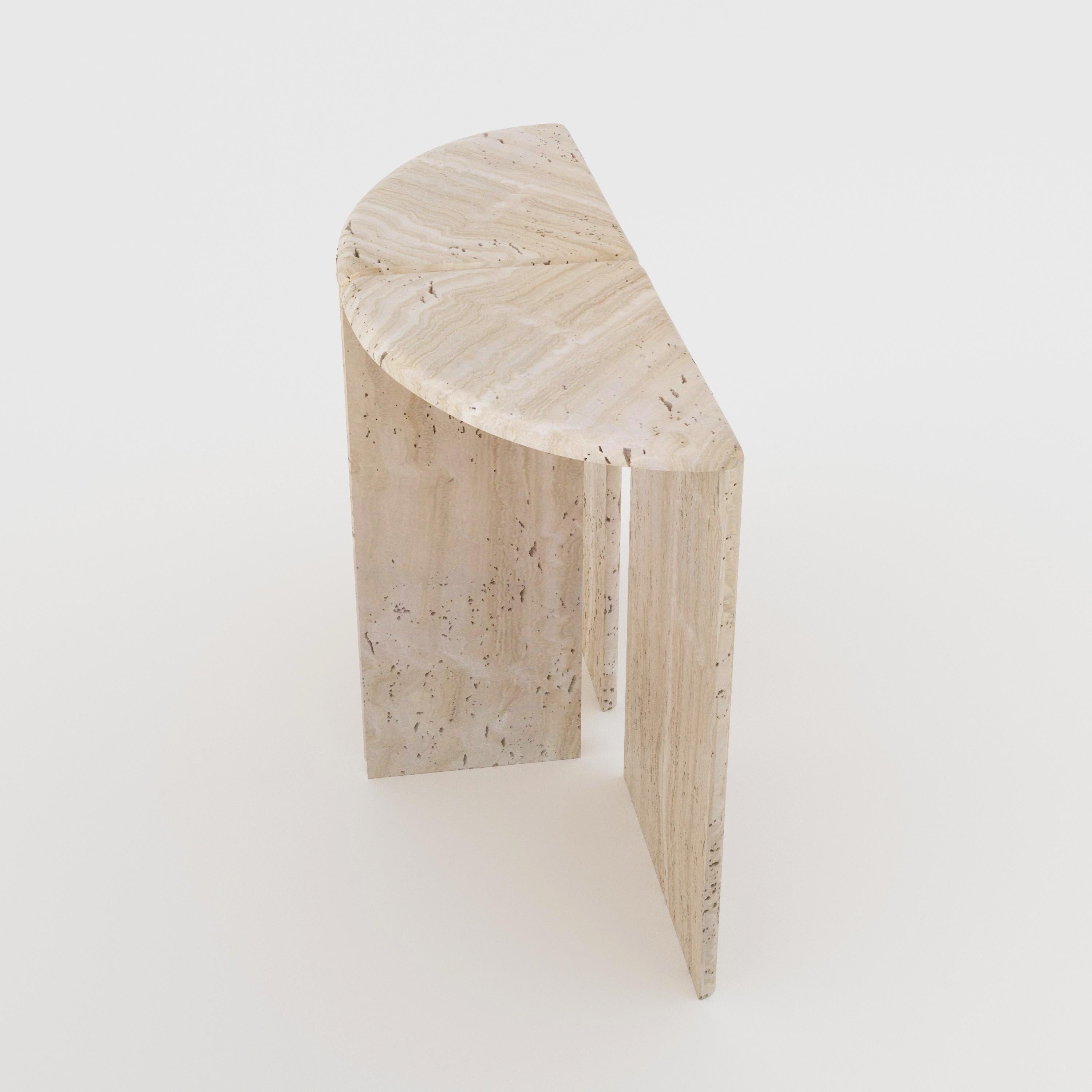A console table handmade out of 30 mm thick honed unfilled Navona Travertine. Inspired by giant water lily pads and their curled rims, it's divided in 2 halves, with each part's rounded edges juxtaposed to the adjacent parts' edges. Available in any
