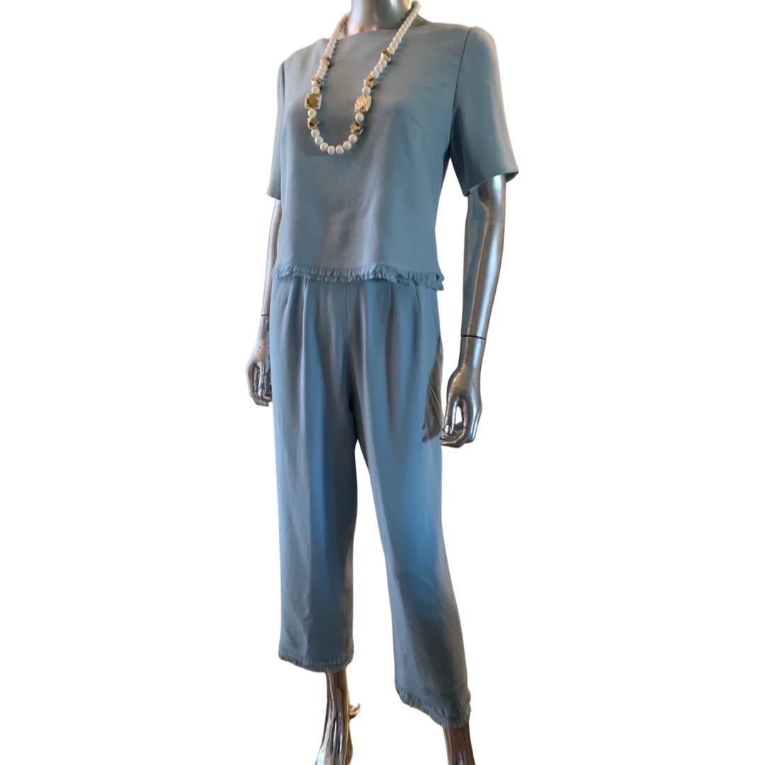 Lily Samii Is a very talented San Francisco designer who specializes in Couture and custom-made clothing. This very chic three piece set is made in a European wool blend crêpe. The set is extremely versatile as the crop blouse works with a matching