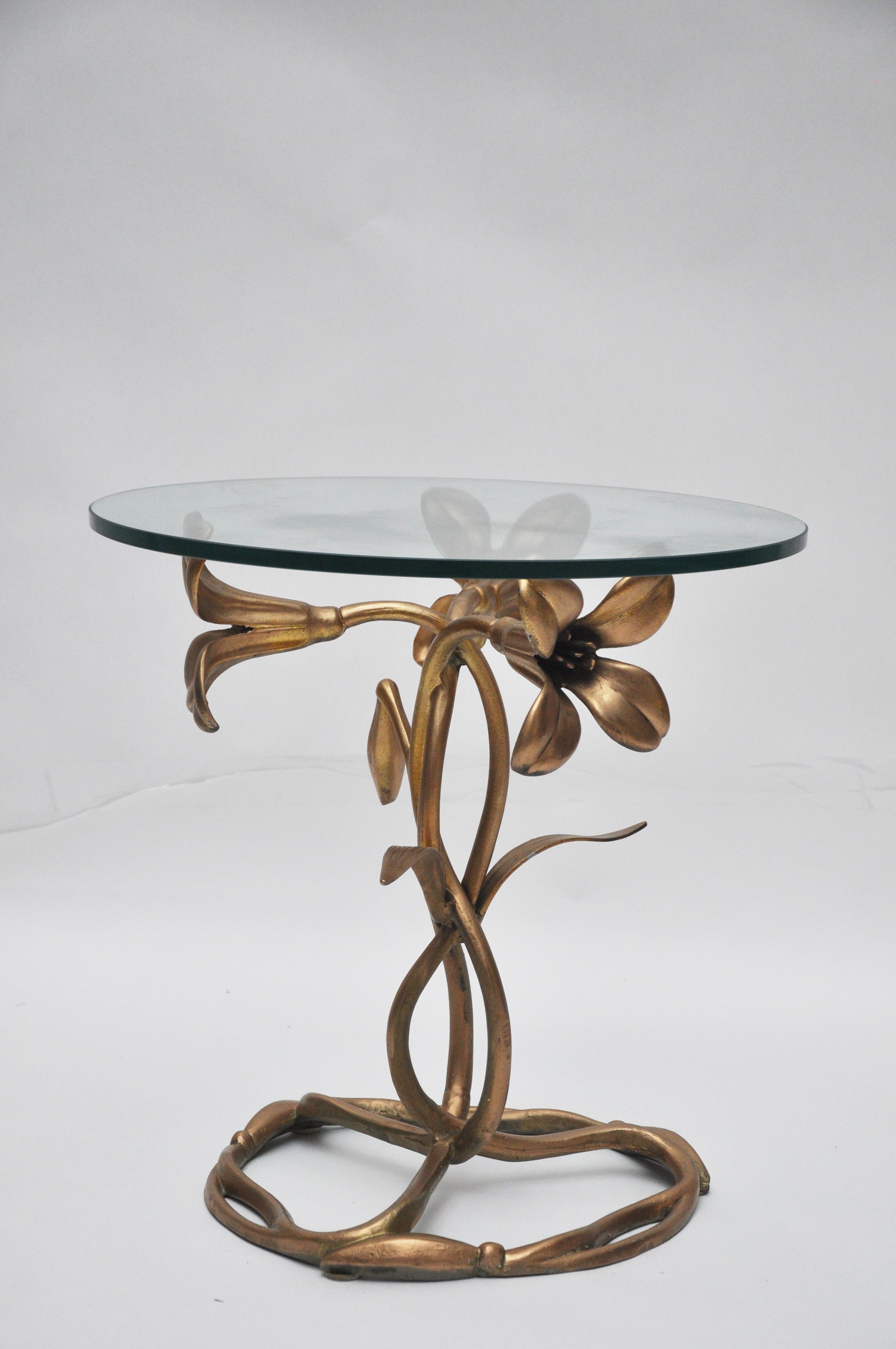 This table is often attributed to Arthur Court and made by Drexel. This lily table has three stems instead of the single stem occasional table.