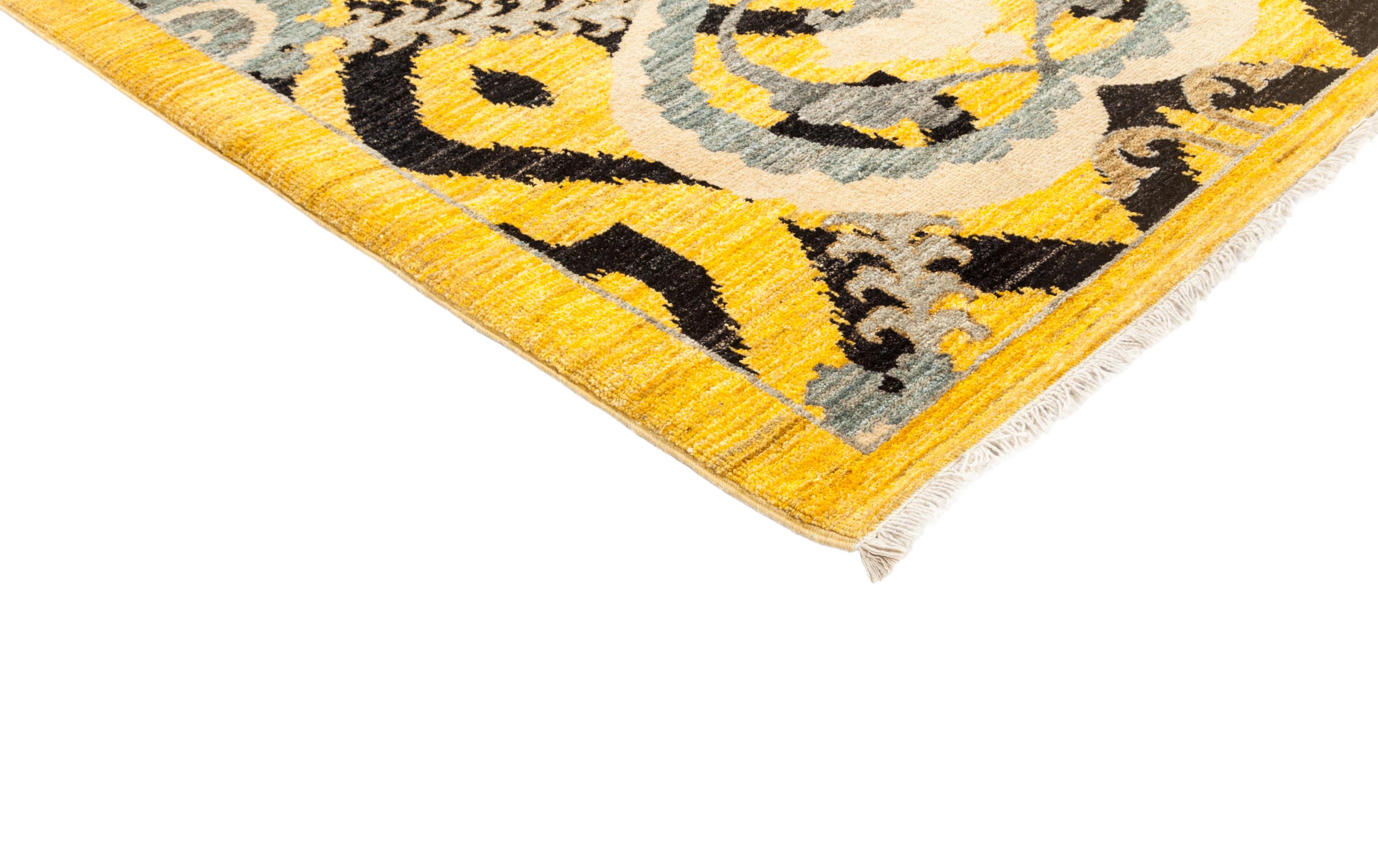 Color: Yellow - Made In: Pakistan. 100% Wool. Whether boasting a field of flowers or ancient tribal symbols, patterned rugs are the easiest way to enrich a space. Subtle colors and intricate motifs reinforce the quiet sophistication of a traditional