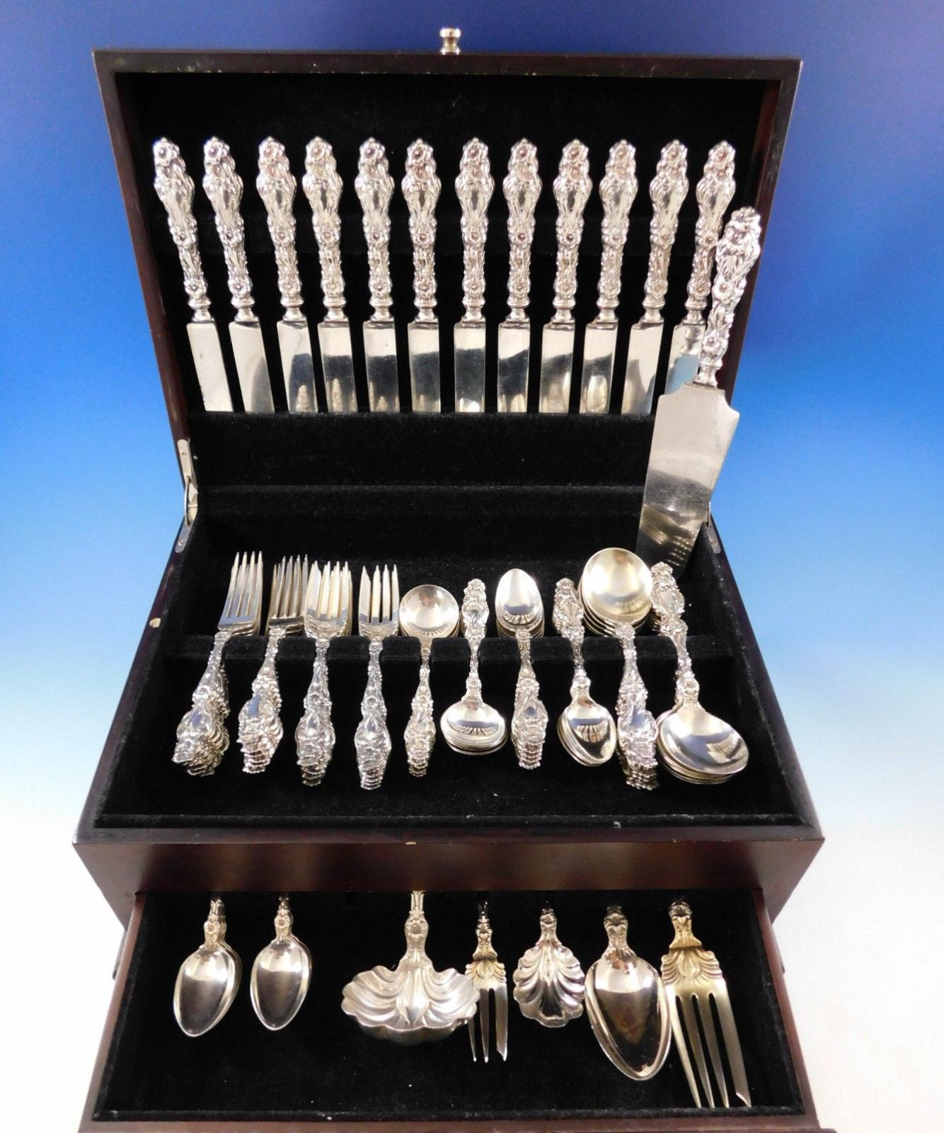 Outstanding early Lily by whiting sterling silver flatware set with desirable hand cast knives - 90 pieces total. This set includes:

12 knives with wide, hand cast handles, 8 3/4