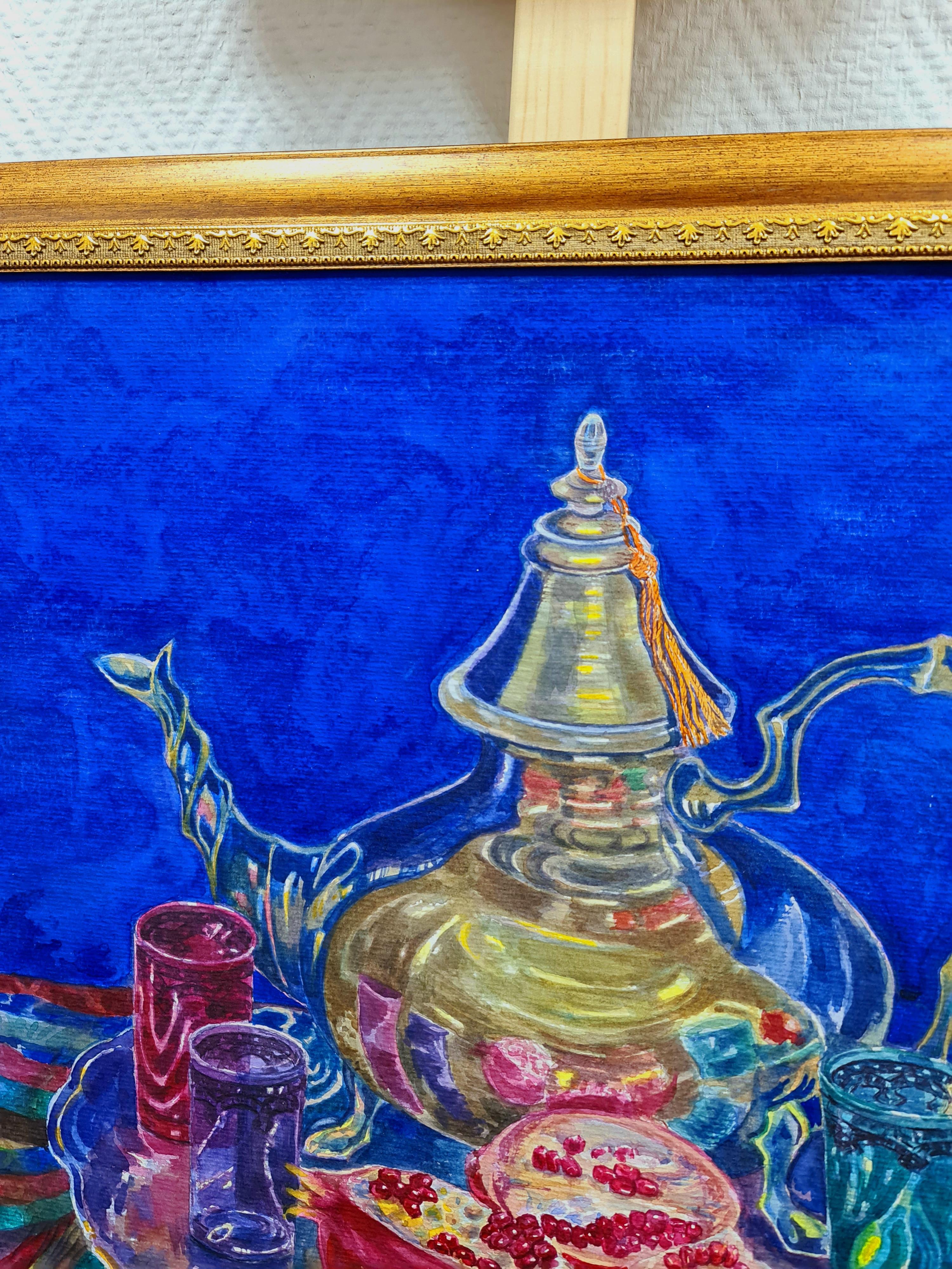 Blue still life with pomegranates and a teapot
