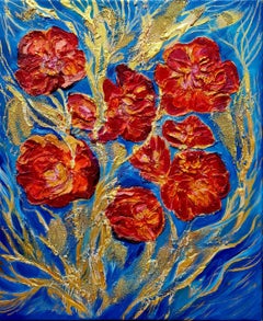 Embossed textured orange flowers on a blue backgraund.Still life abstraction