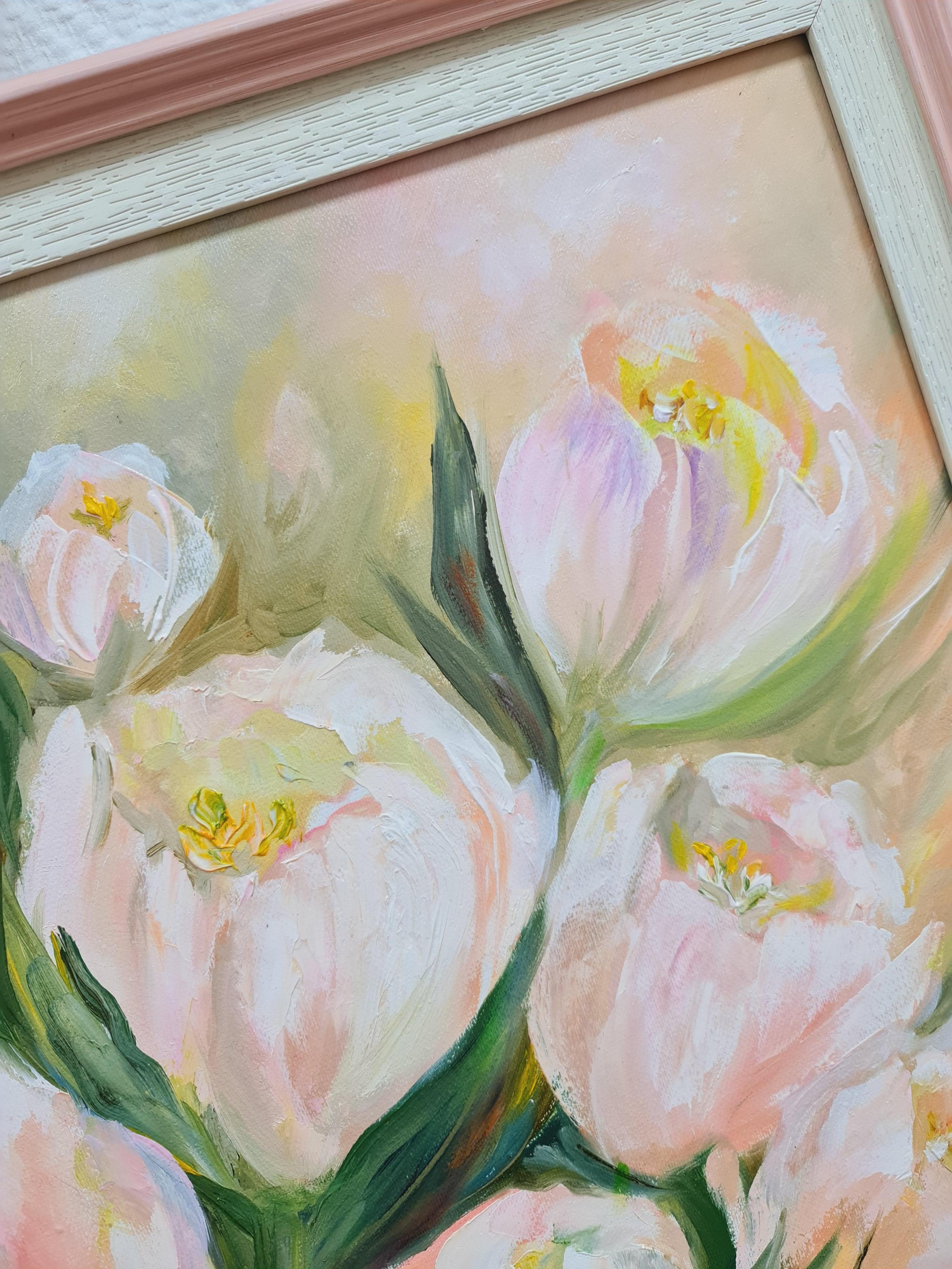 White tulips on a pink background. Morning, spring. The painting is in a modern interior, the baguette is perfectly matched. Gentle morning lighting. Gorgeous beautiful white flowers. Still life creates a spring mood. The joy of life. The triumph of