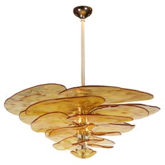 Lilypad Bubbled Chandelier Composed of Amber Glass Blades by Laura Gonzalez