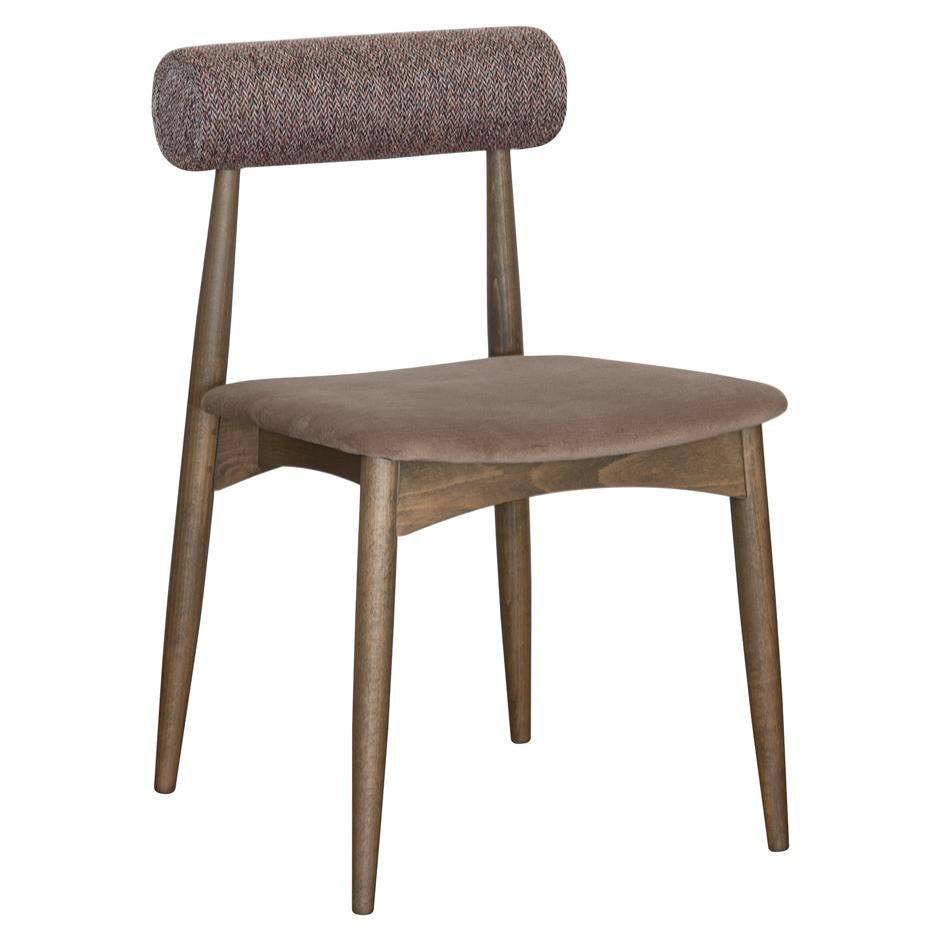 Dovain Studio presents you the Lima chair that is entirely manufactured in wood and has a soft seat composed with foam and fabric that can be chosen with a variety of colors and textures. 
Comfort and durability are the goals for this Lima chair, a