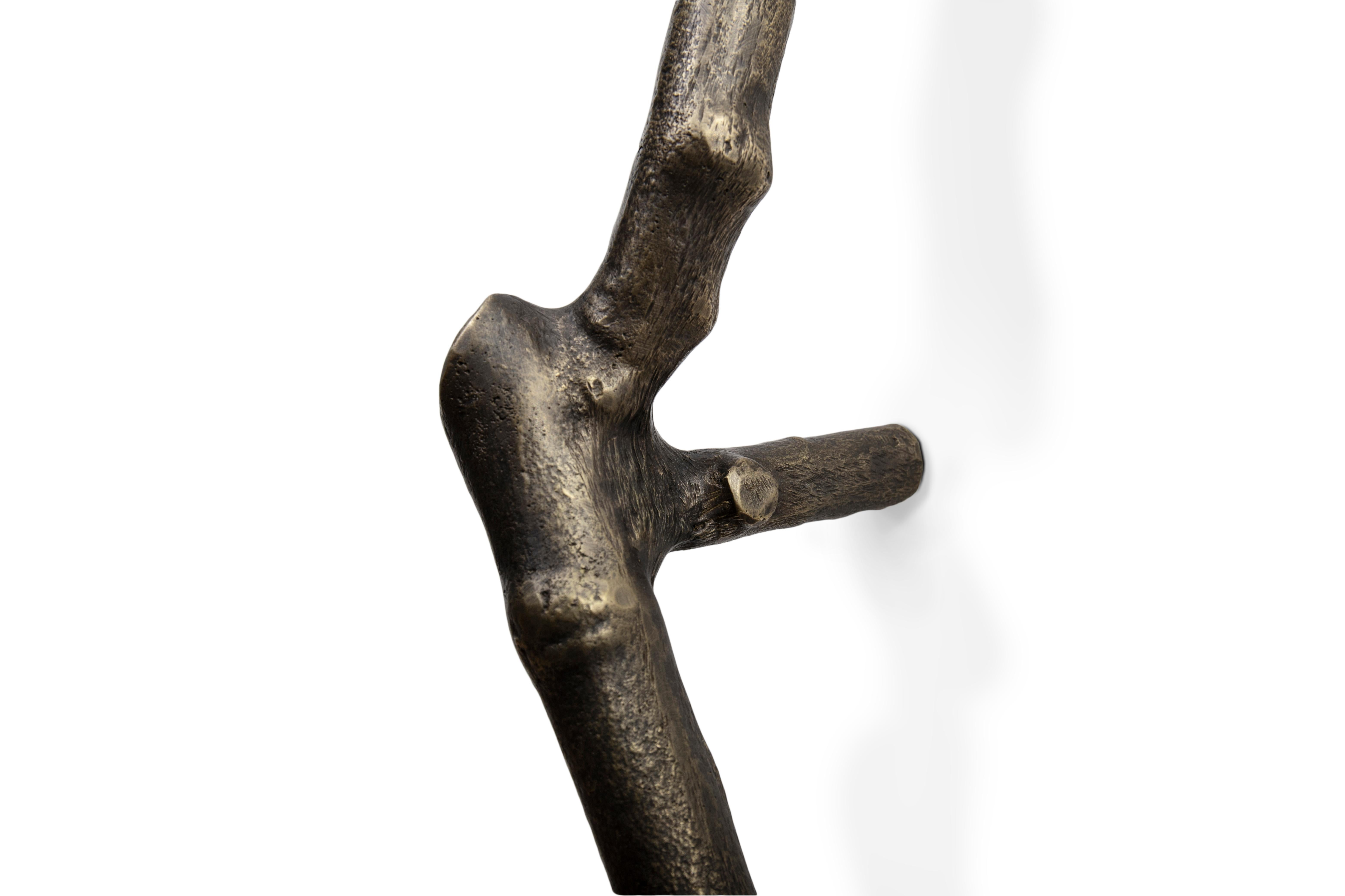 For the design of the Limb Door Hardware, the inspiration was the image of a white sand beach with an array of tree branches, grown in solid soil and brought out to us by the strength of the blue sea. Driven by the natural cycles we shaped the Limb