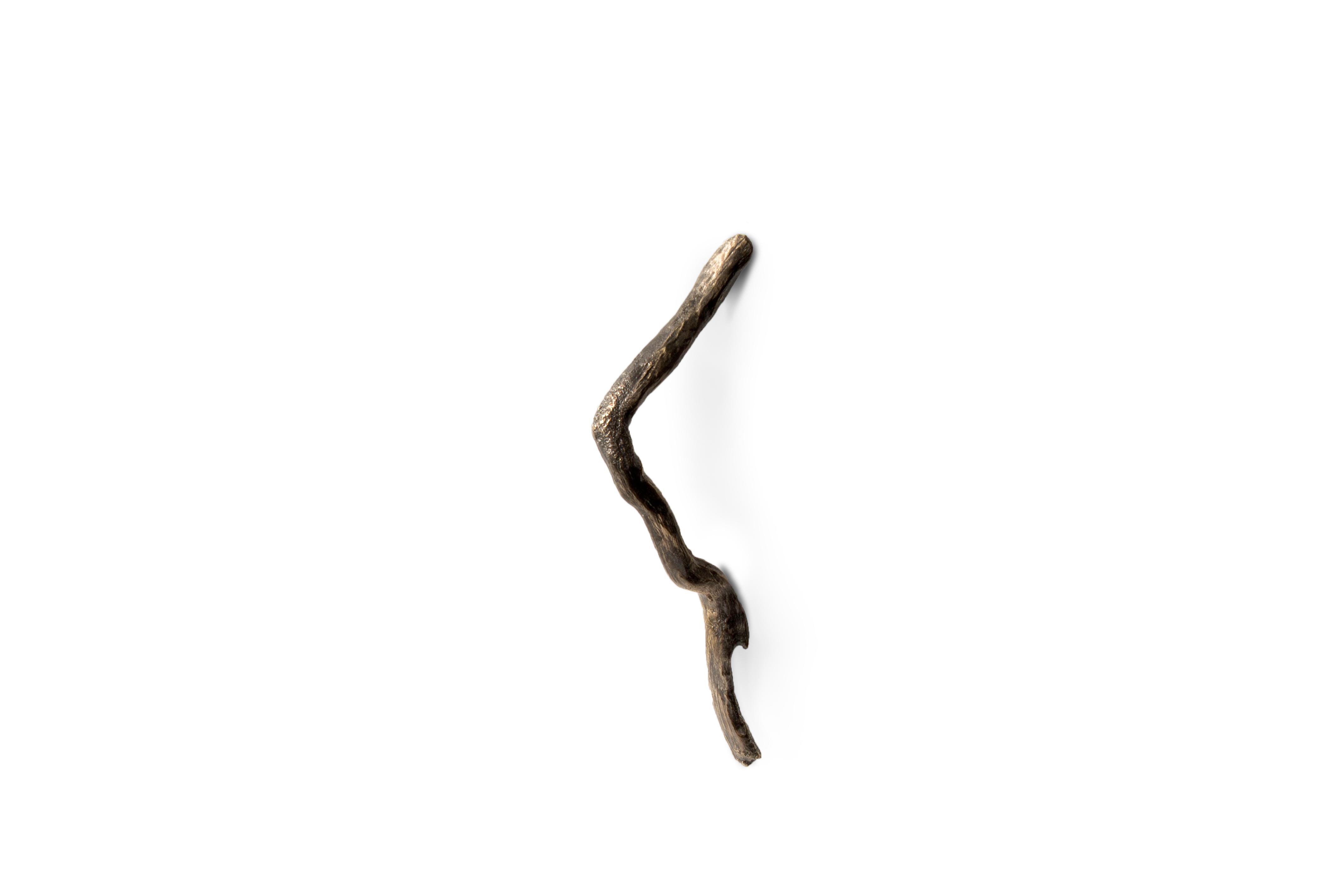 For the design of the Limb Door Hardware, the inspiration was the image of a white sand beach with an array of tree branches, grown in solid soil and brought out to us by the strength of the blue sea. Driven by the natural cycles we shaped Limb